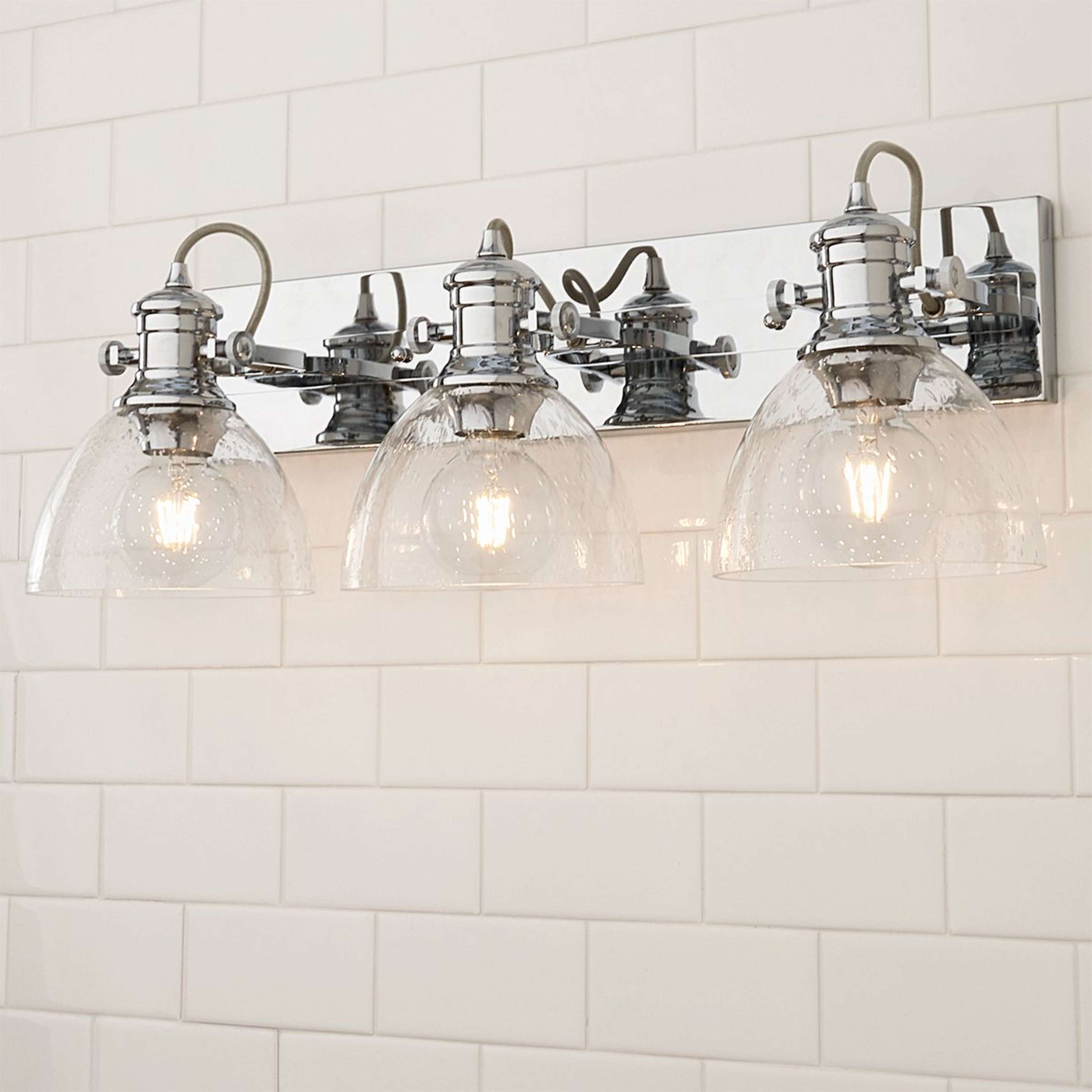A Gwynn Isle Dome Vanity Light - 3 light with Chrome / Clear Seeded Glass color