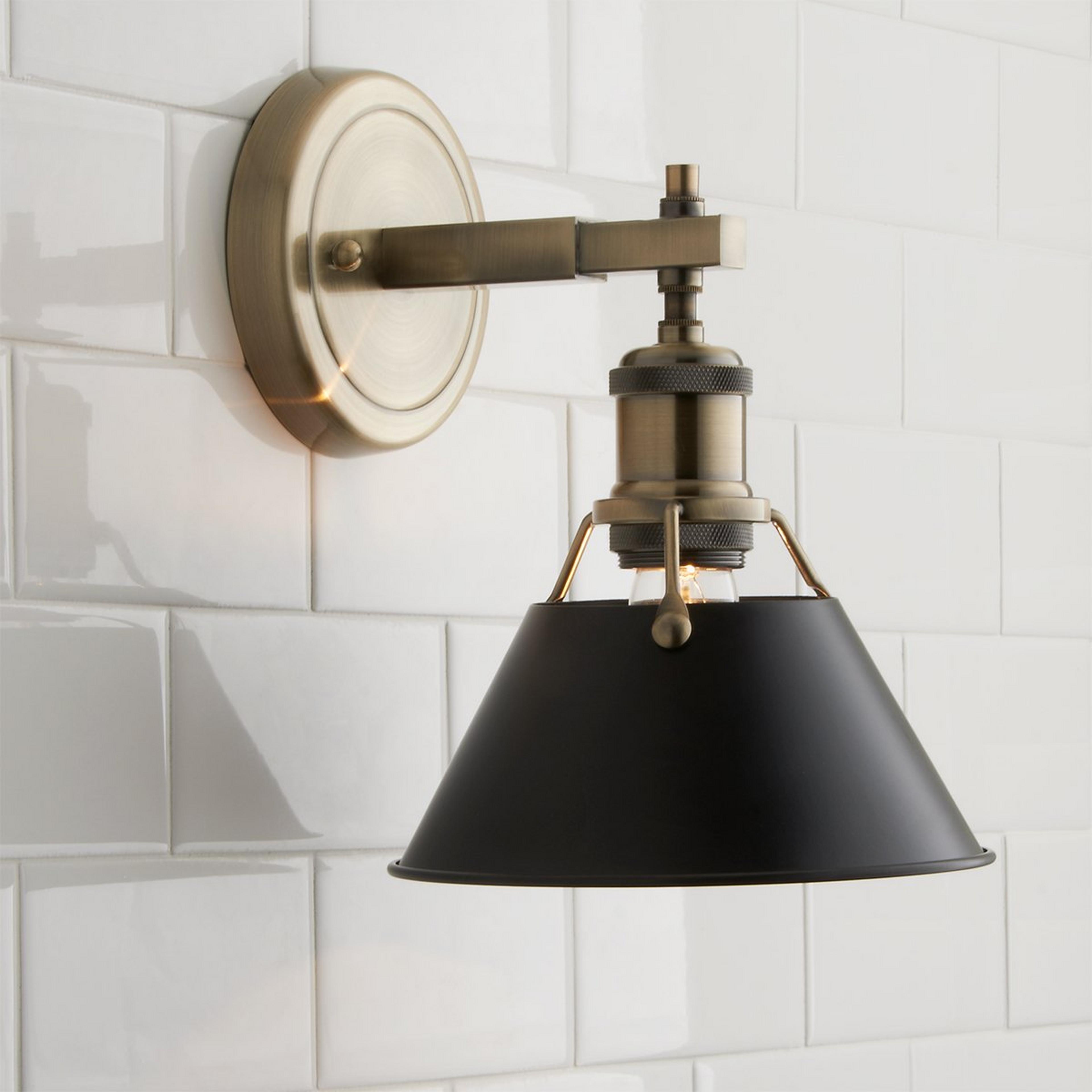 A Truncated Cone Shade Sconce with Aged Brass / Black color