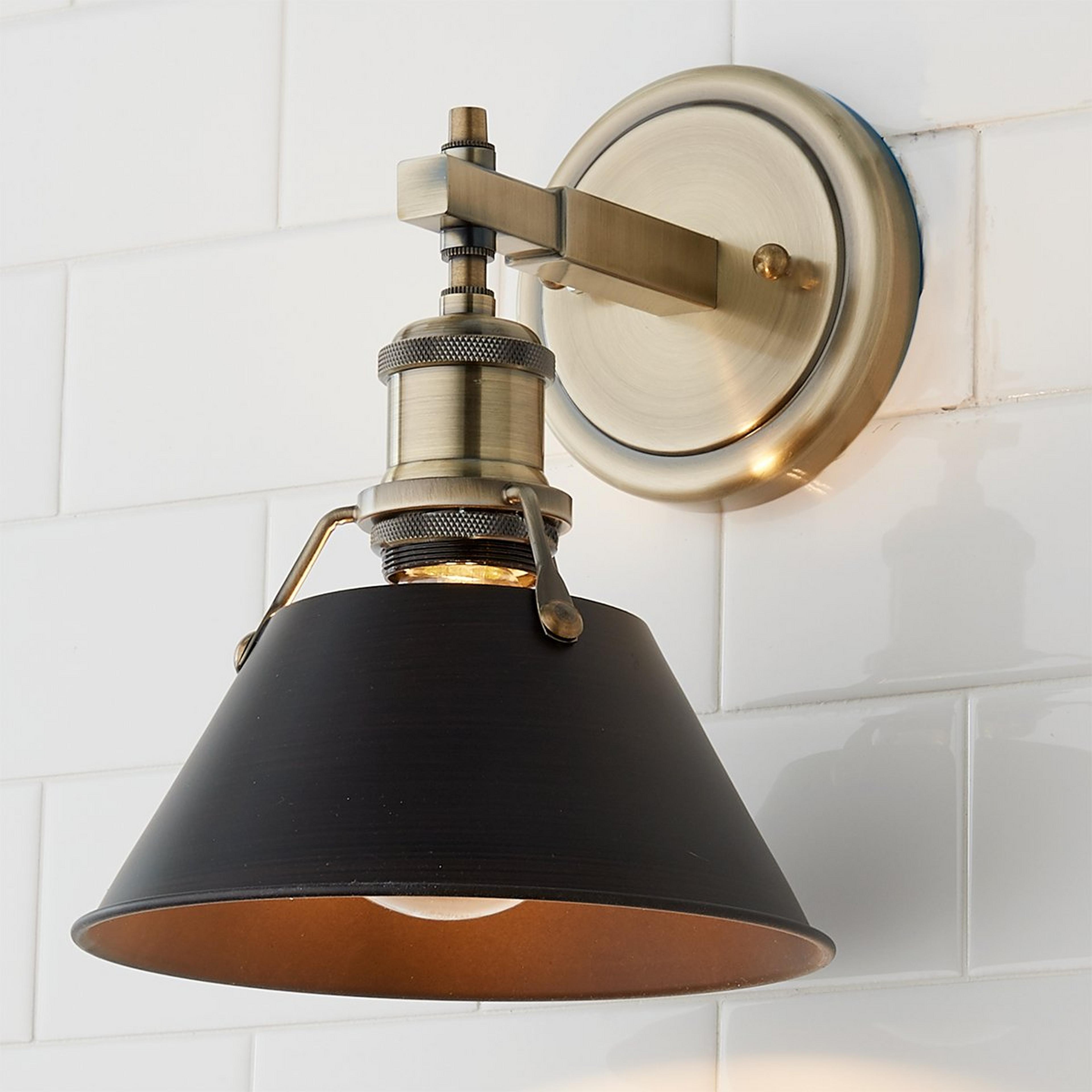 A Truncated Cone Shade Sconce with Aged Brass / Bronze color