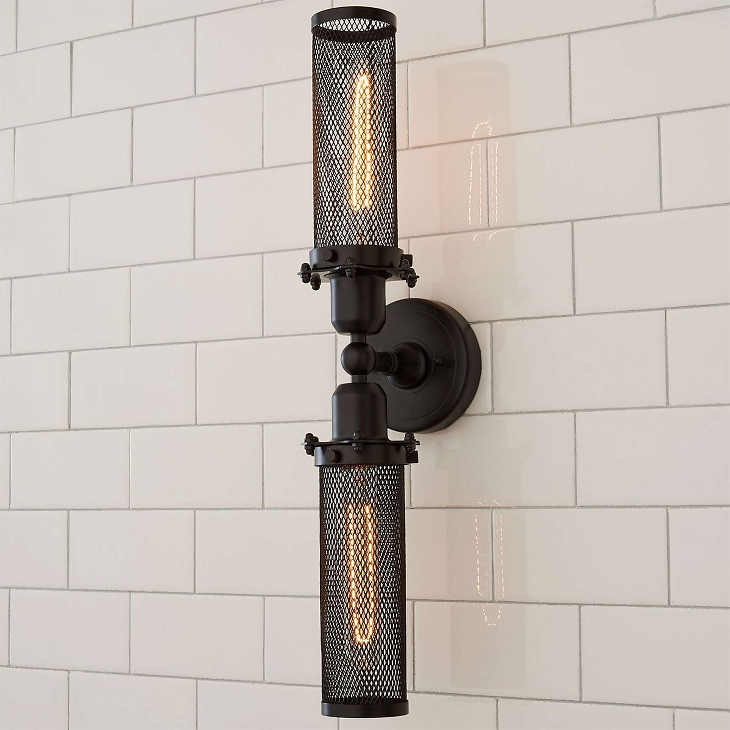A Mesh Double Cylinder Sconce with Dark Bronze color