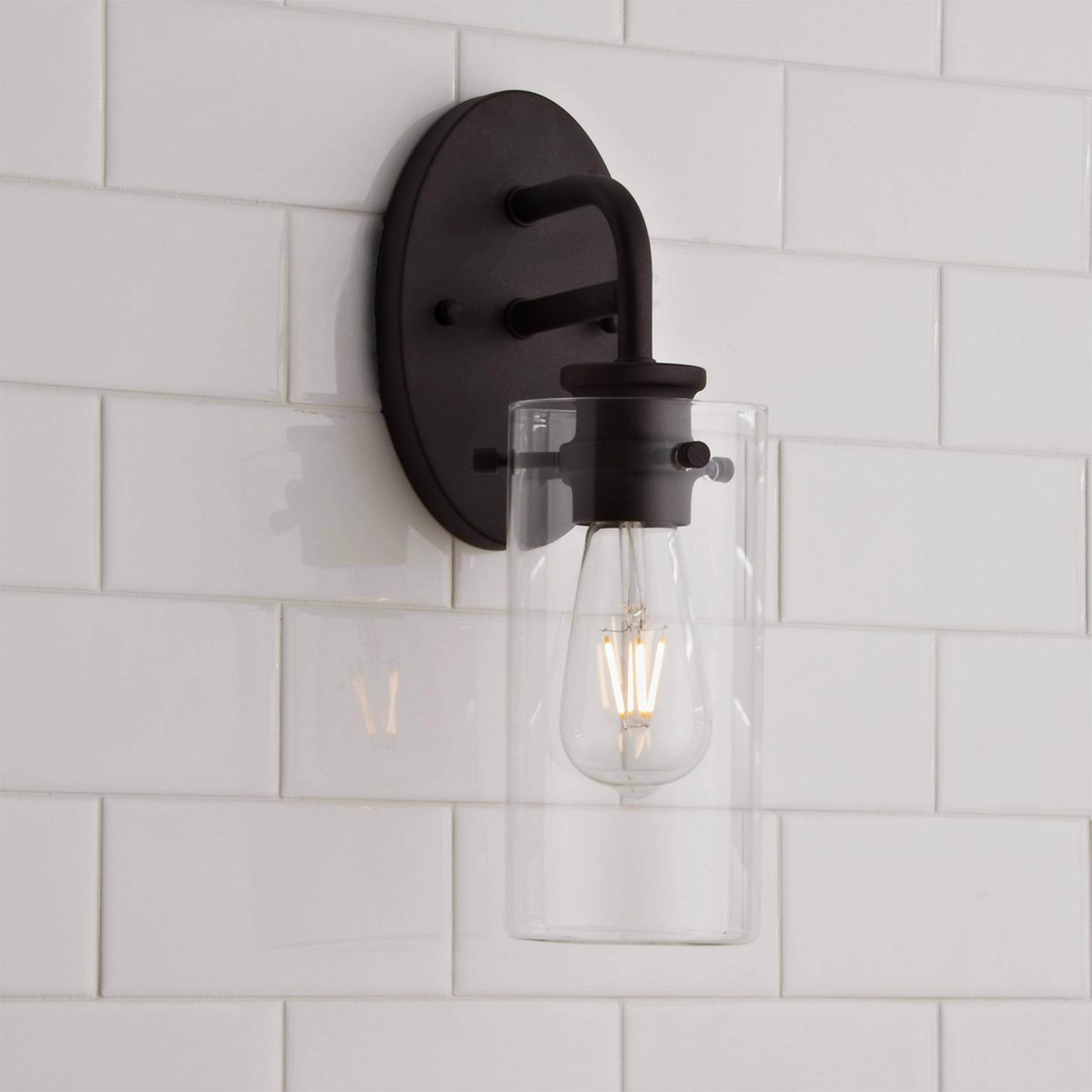 A Stacked Ridge Bath Sconce with Metallic Bronze / Clear color