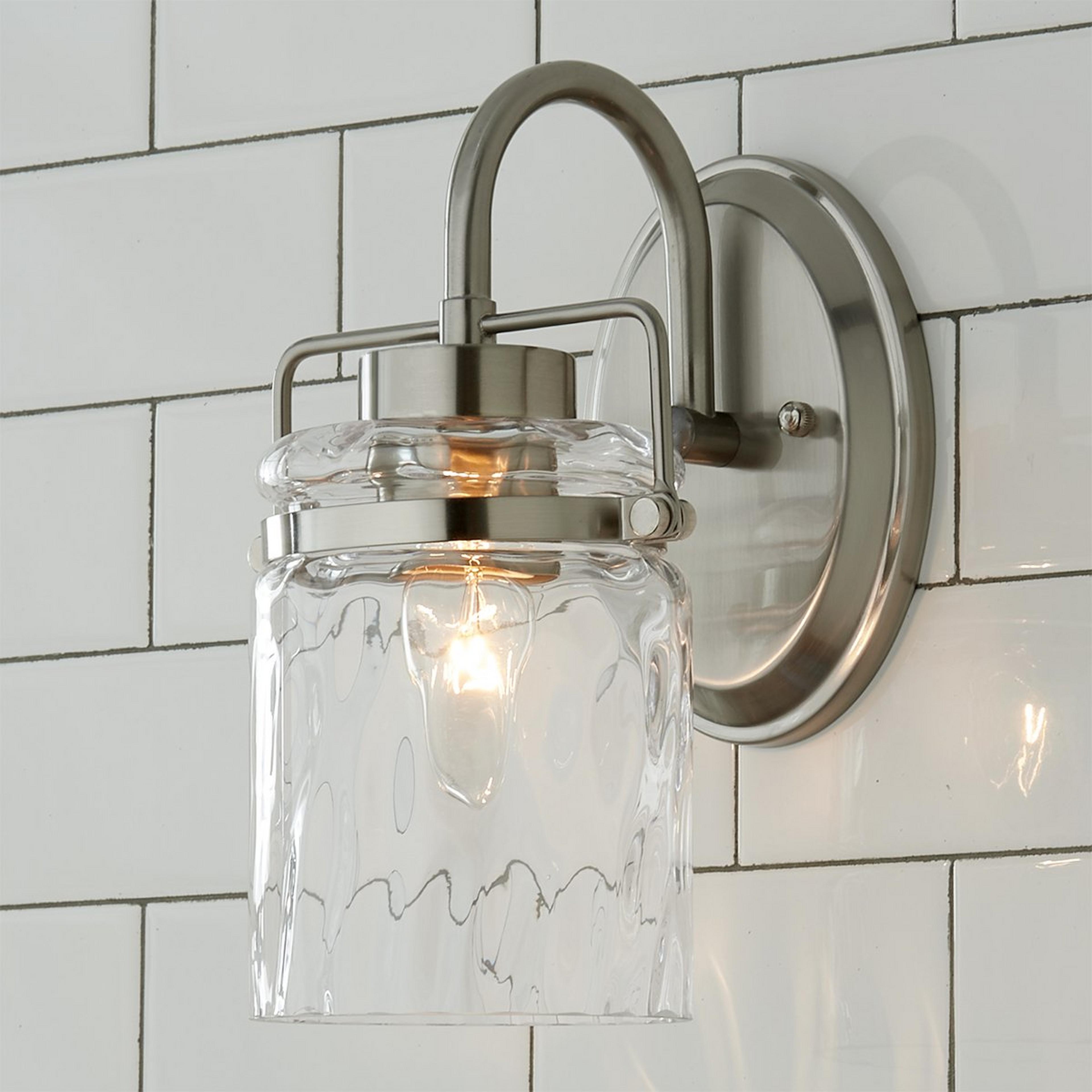 A Looped Water Glass Bath Sconce with Brushed Nickel color