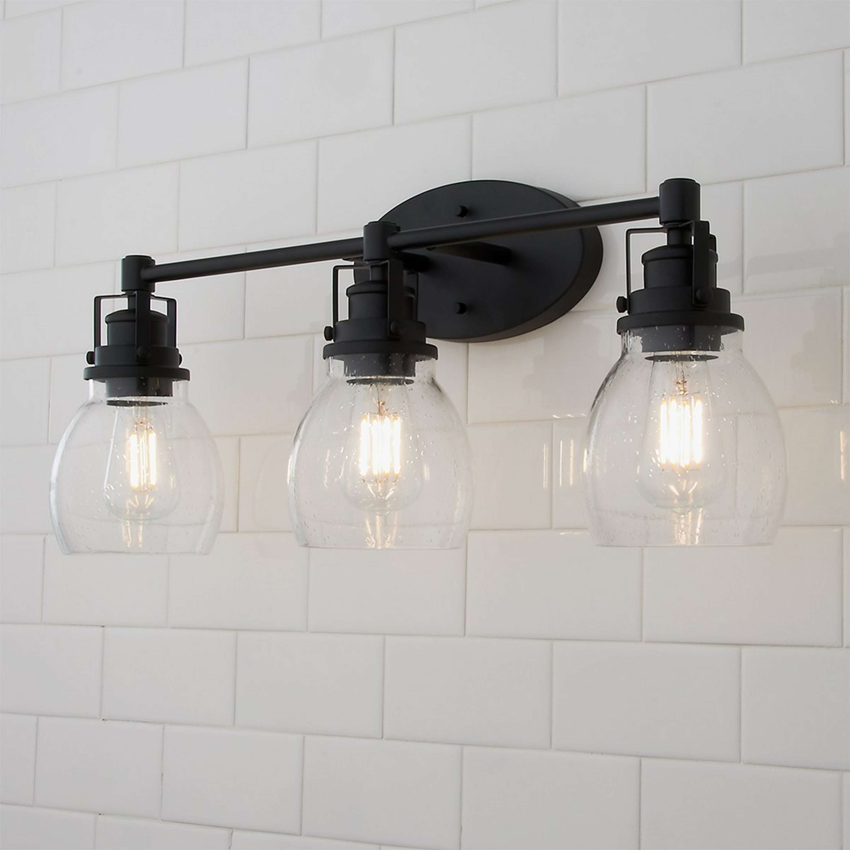 A Soft Seeded Vanity Light - 3 Light with Matte Black / Seeded Glass color