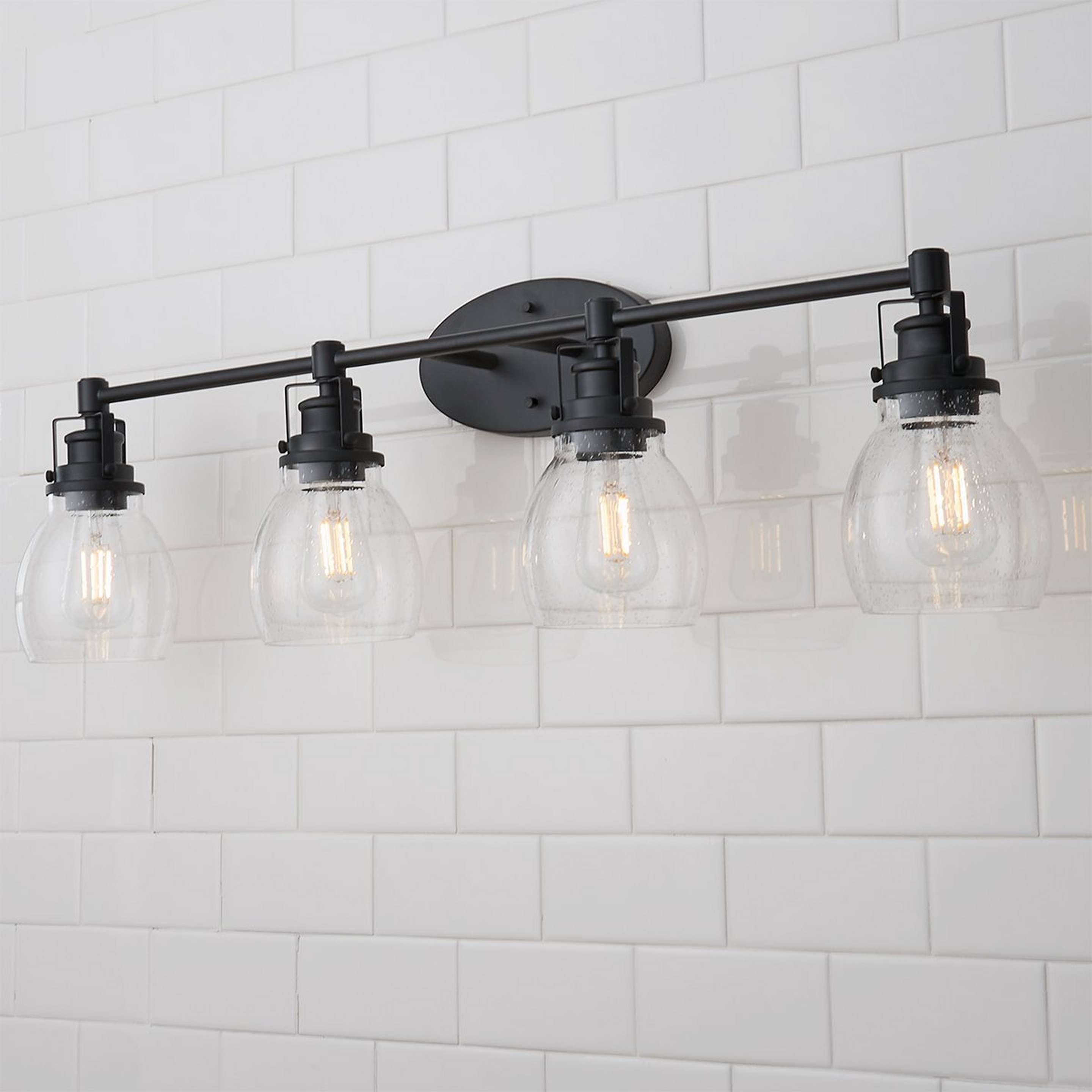 A Soft Seeded Vanity Light - 4 Light with Matte Black / Seeded Glass color