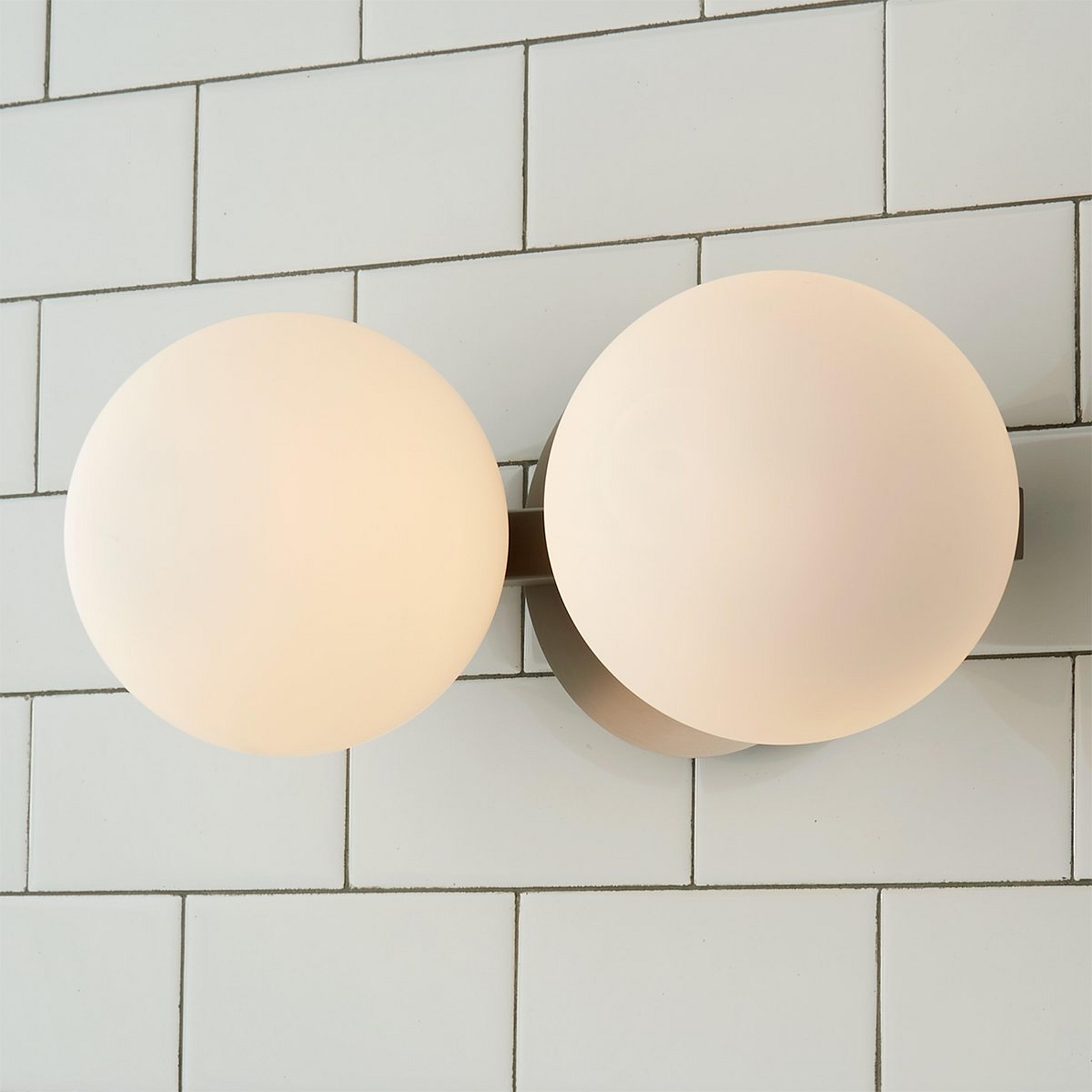 A Modern Milky Globe Vanity Light - 2 Light with Satin Nickel / Opal color