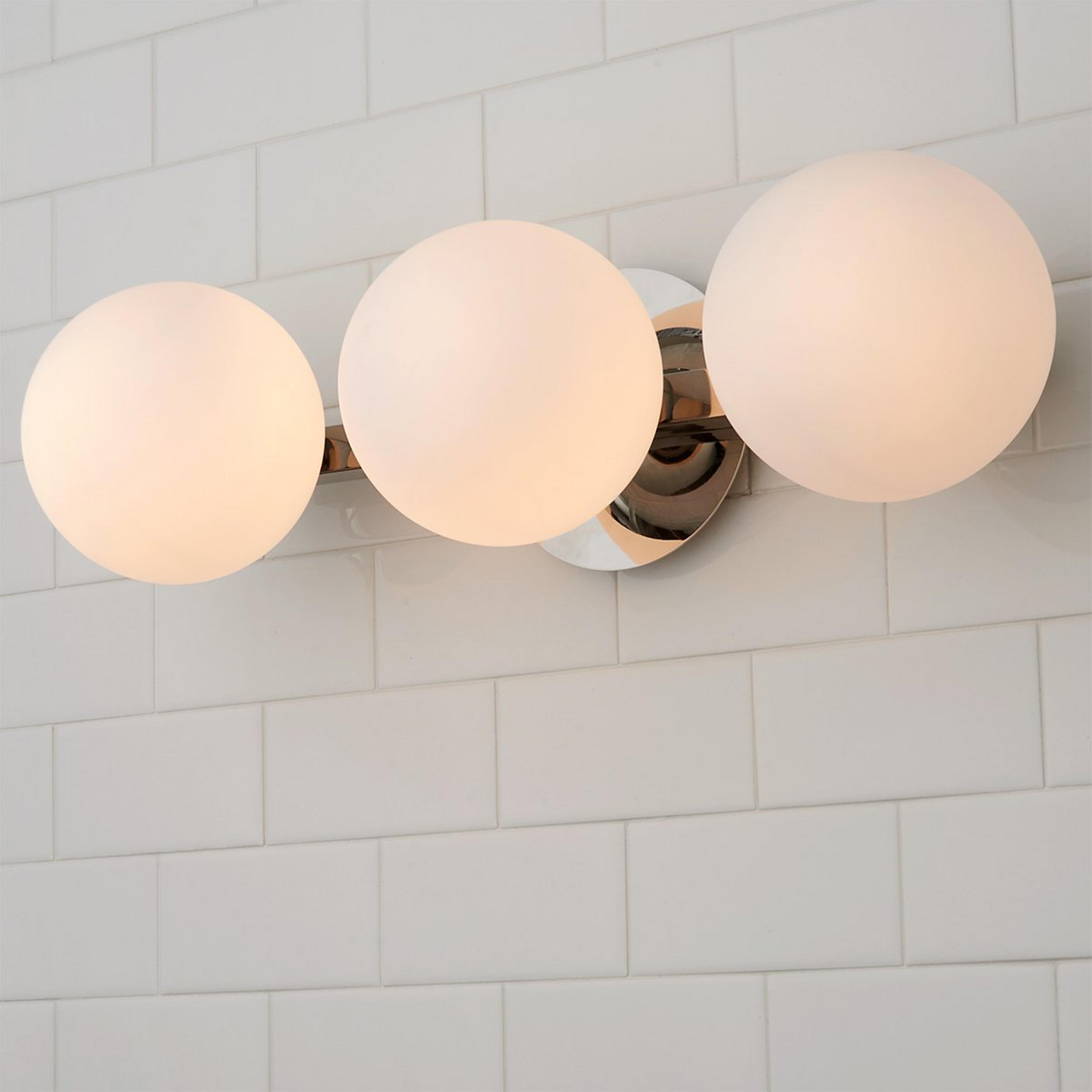 A Modern Milky Globe Vanity Light - 3 Light with Polished Nickel / Opal color