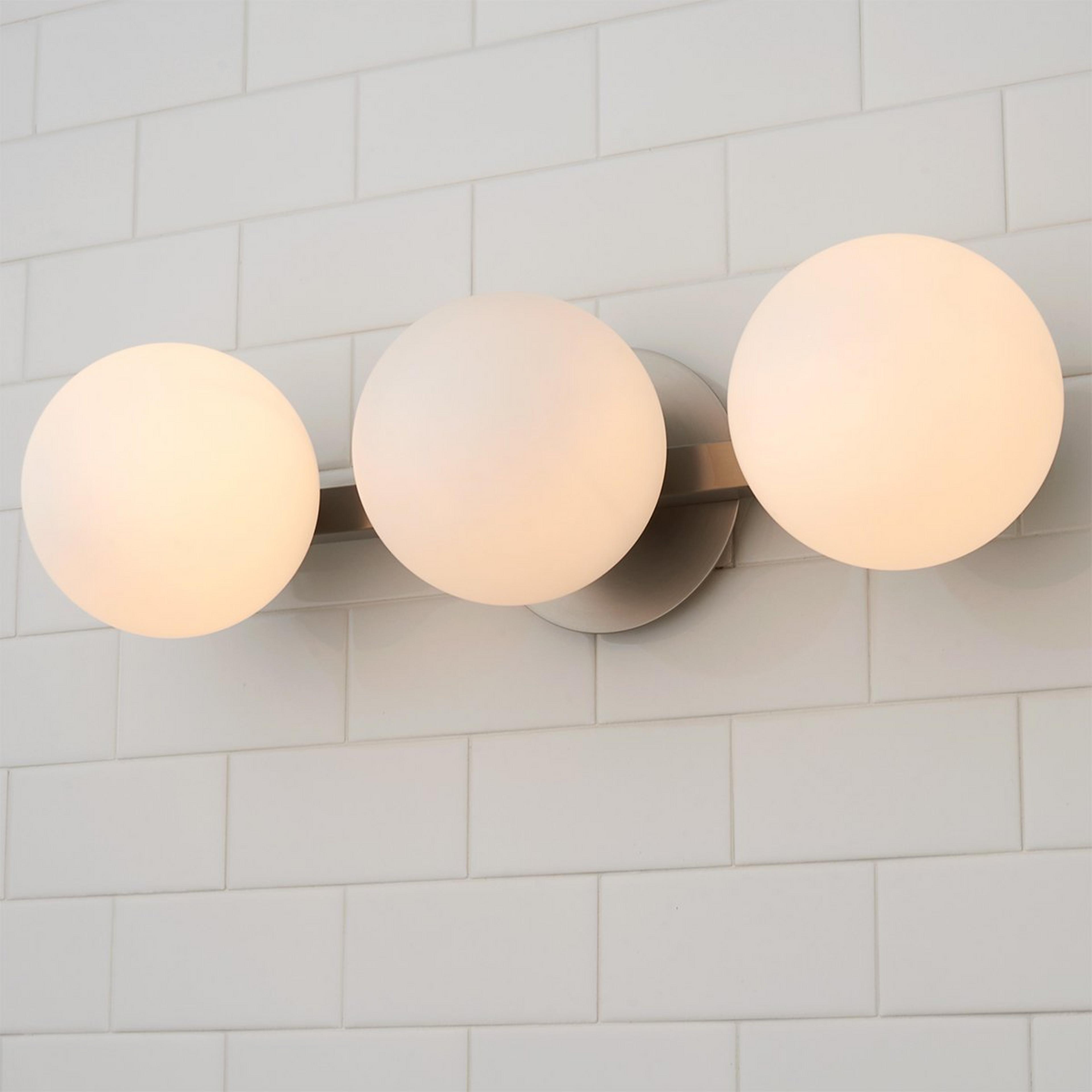 A Modern Milky Globe Vanity Light - 3 Light with Satin Nickel / Opal color