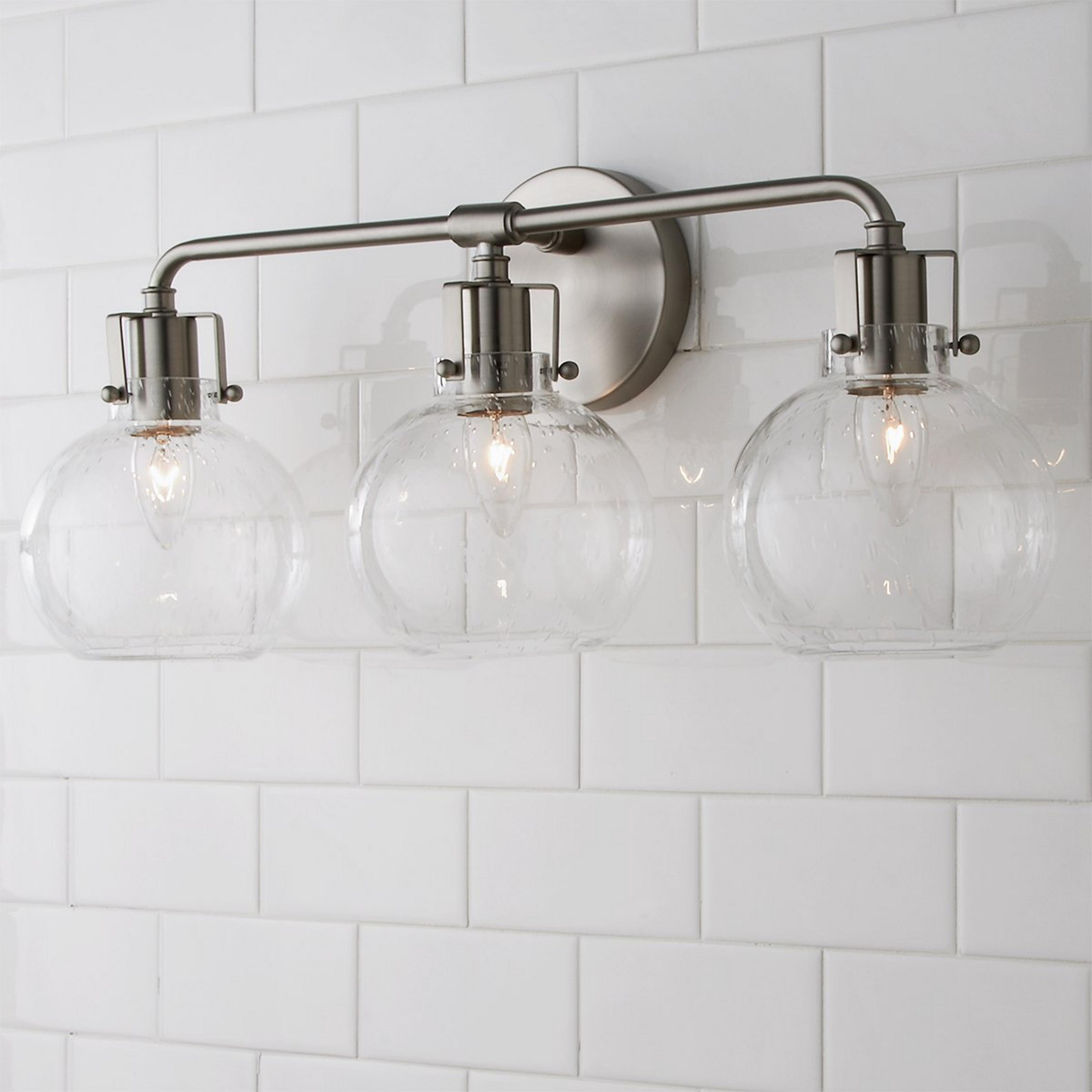 A Hinley Seeded Glass Vanity Light - 3 Light with Satin Nickel color
