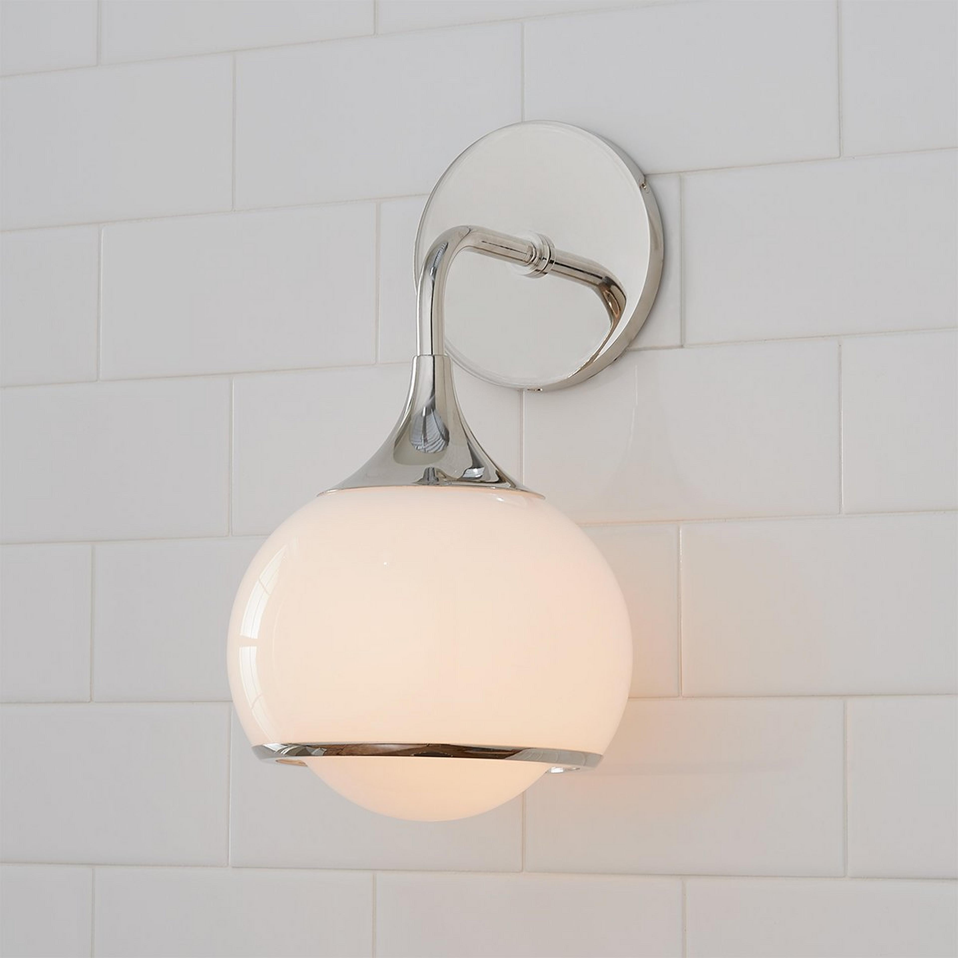 A Diner Drop Sconce with Polished Nickel / White Glass color