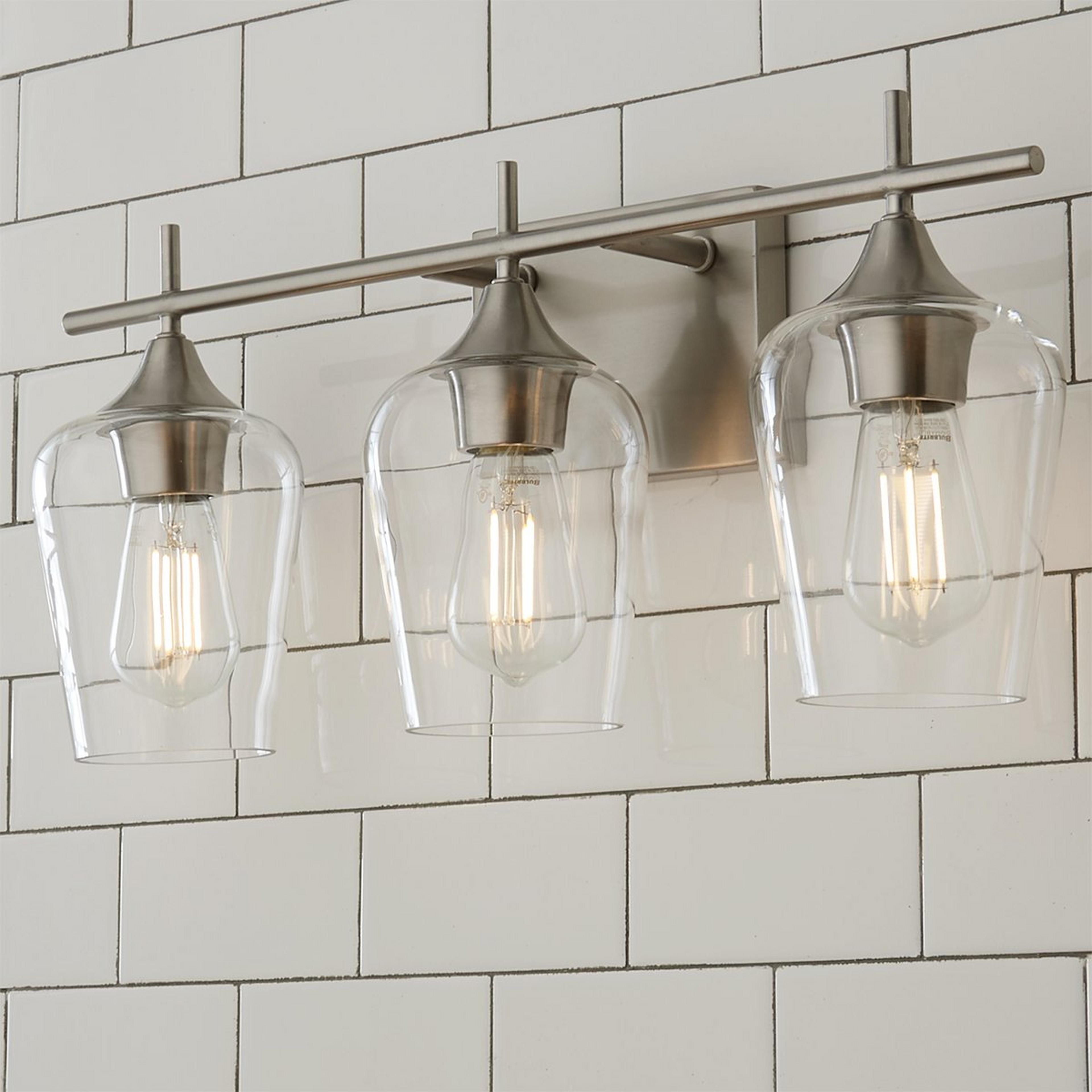A Ashley Vanity Light - 3 Light with Satin Nickel / Clear color