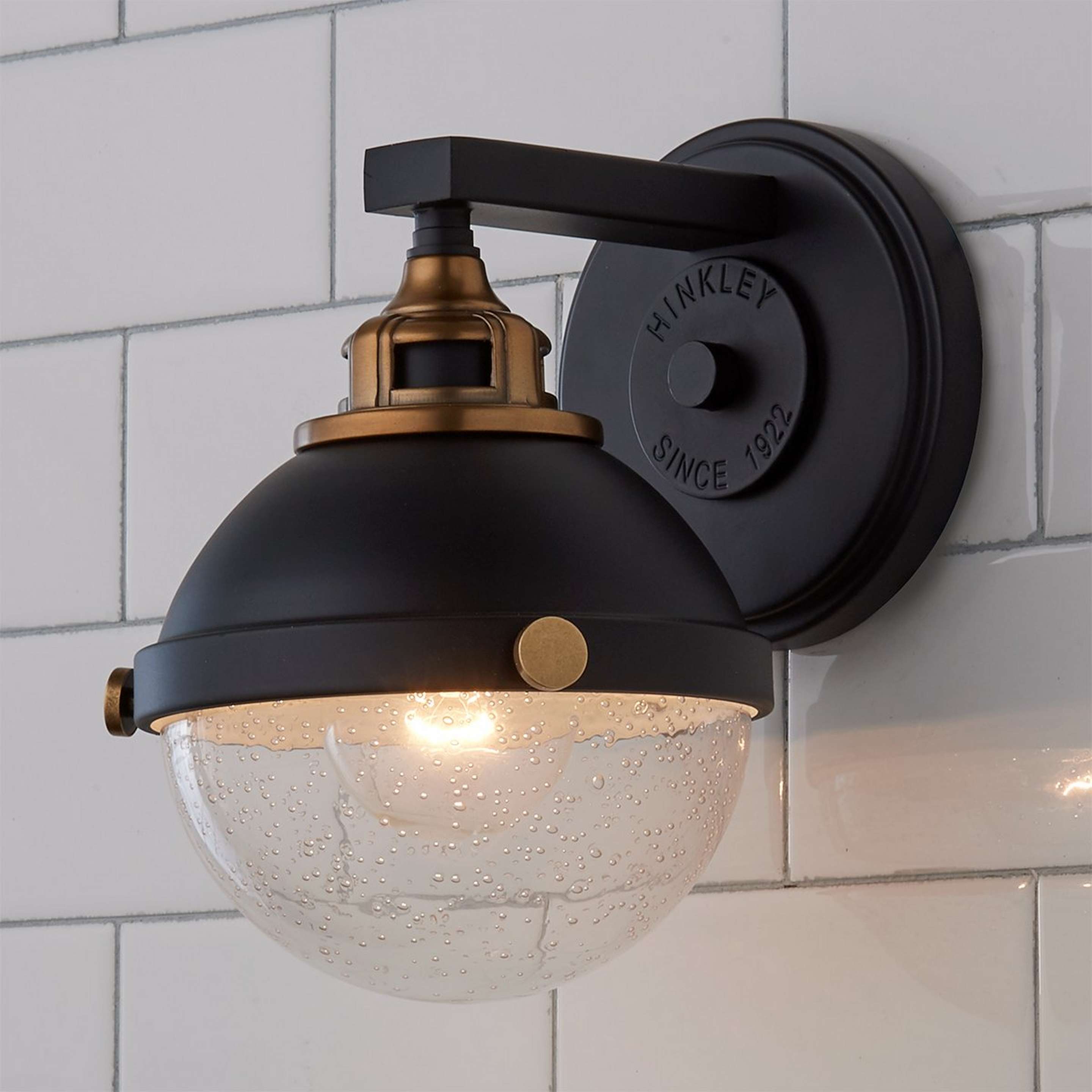 A Decor Declaration Bath Sconce with Black / Aged Brass / Seeded Glass color