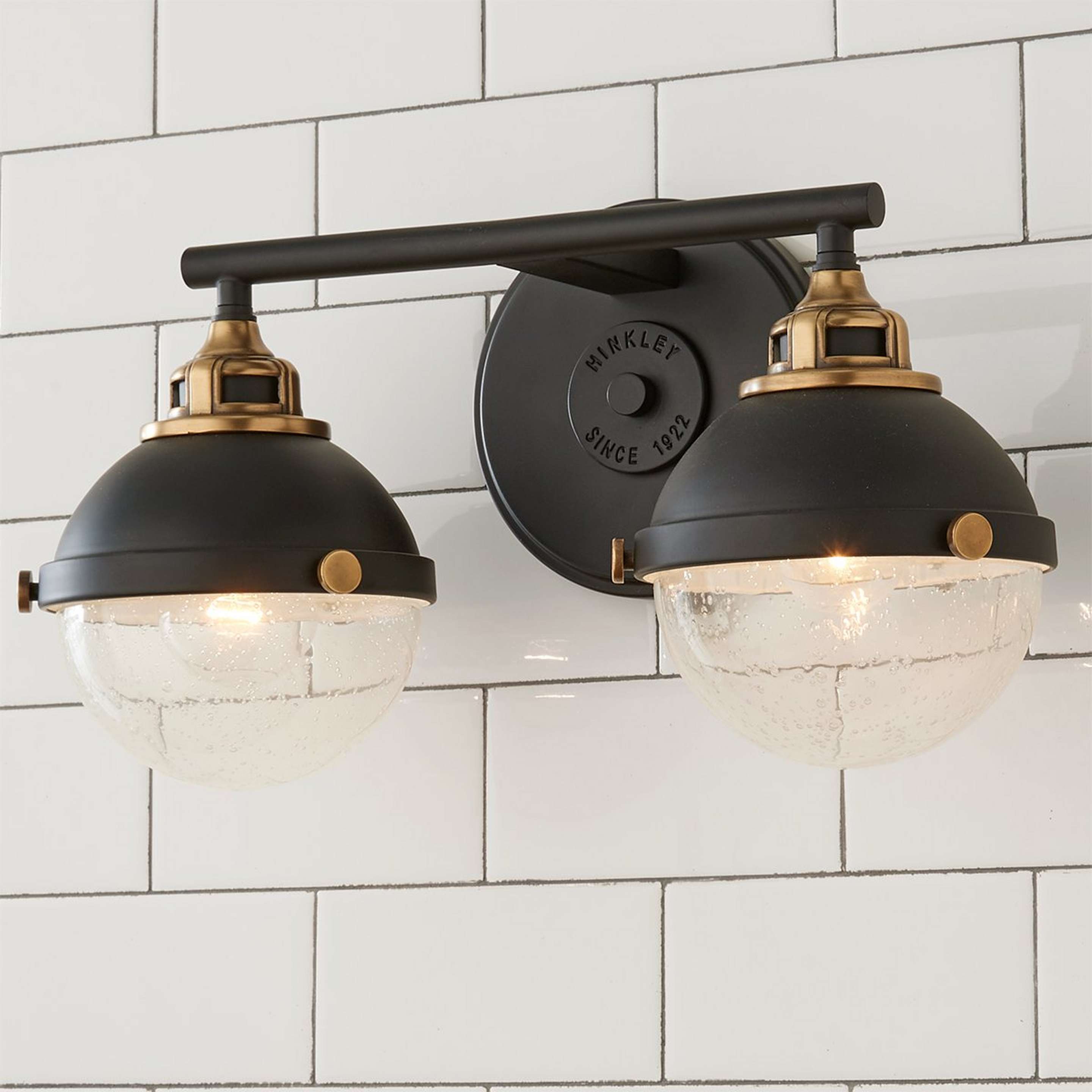 A Decor Declaration Vanity Light - 2 Light with Black / Aged Brass / Seeded Glass color