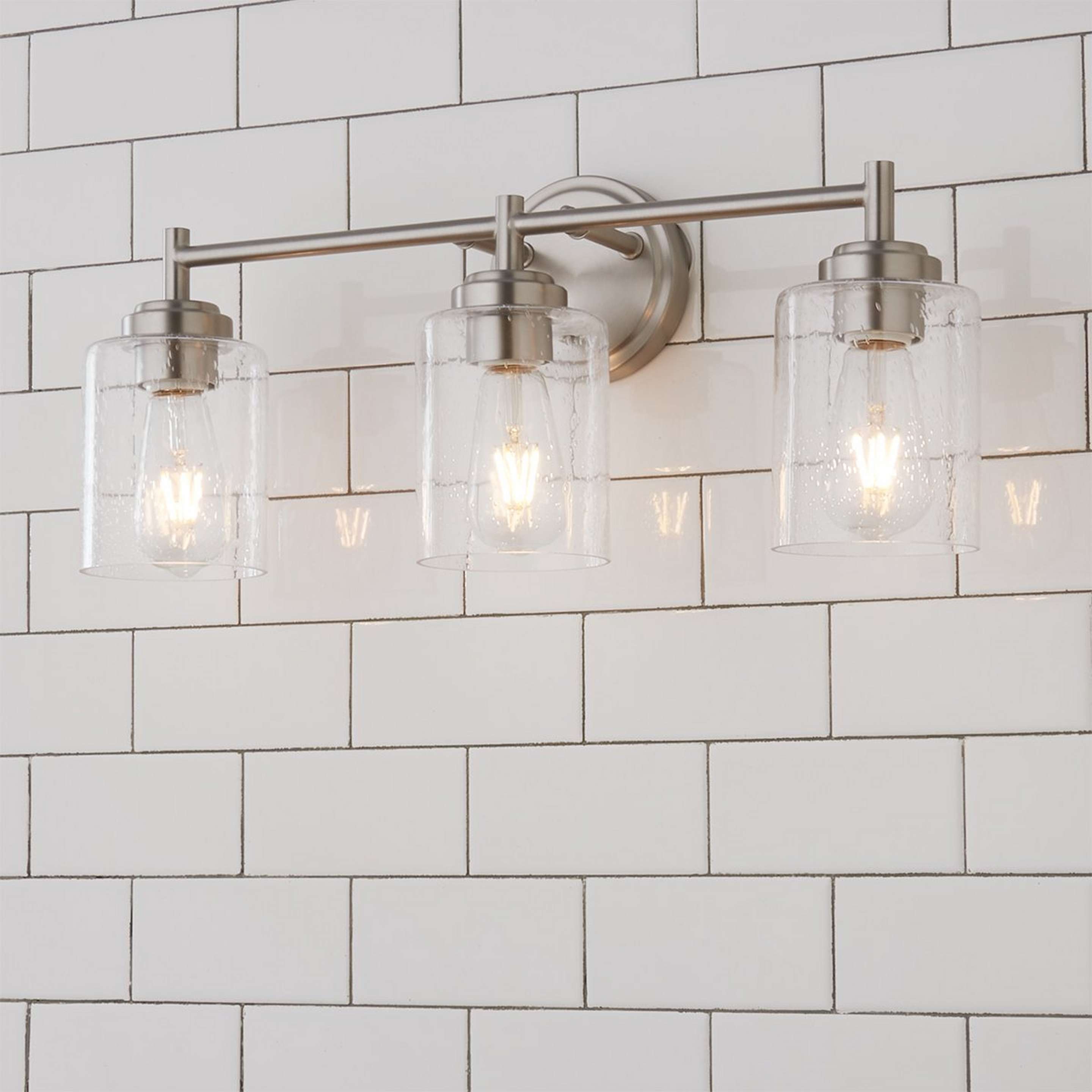 A Cassandra Vanity Light - 3 Light with Brushed Nickel / Clear Seeded color
