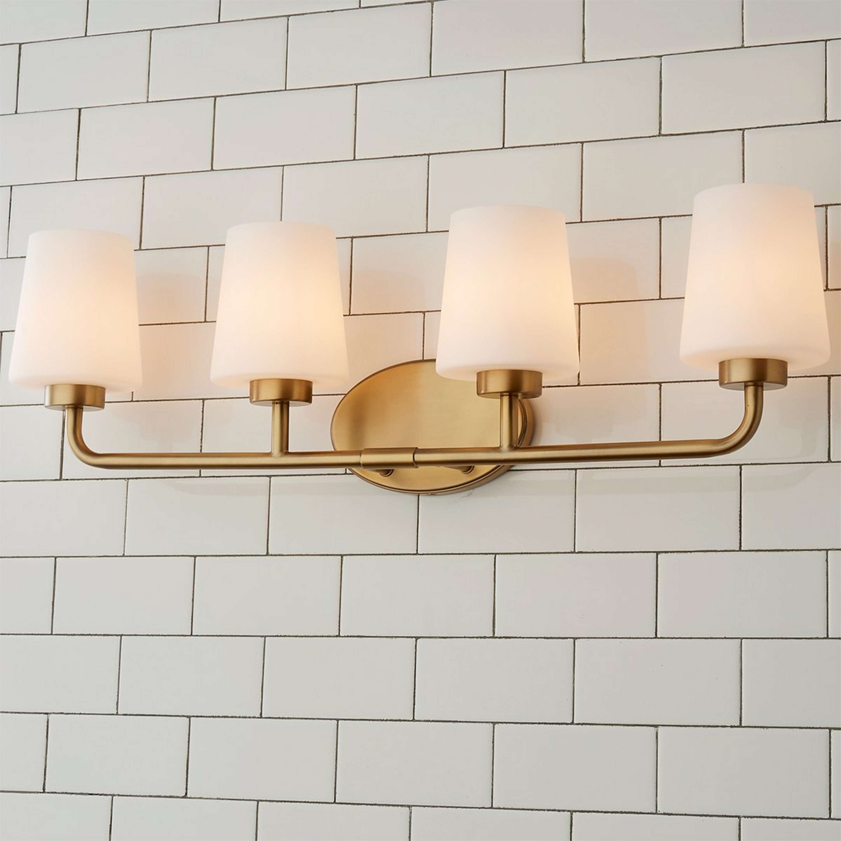 A Minimalist Molly Vanity Light - 4 Light with Warm Brass / White Opal Glass color