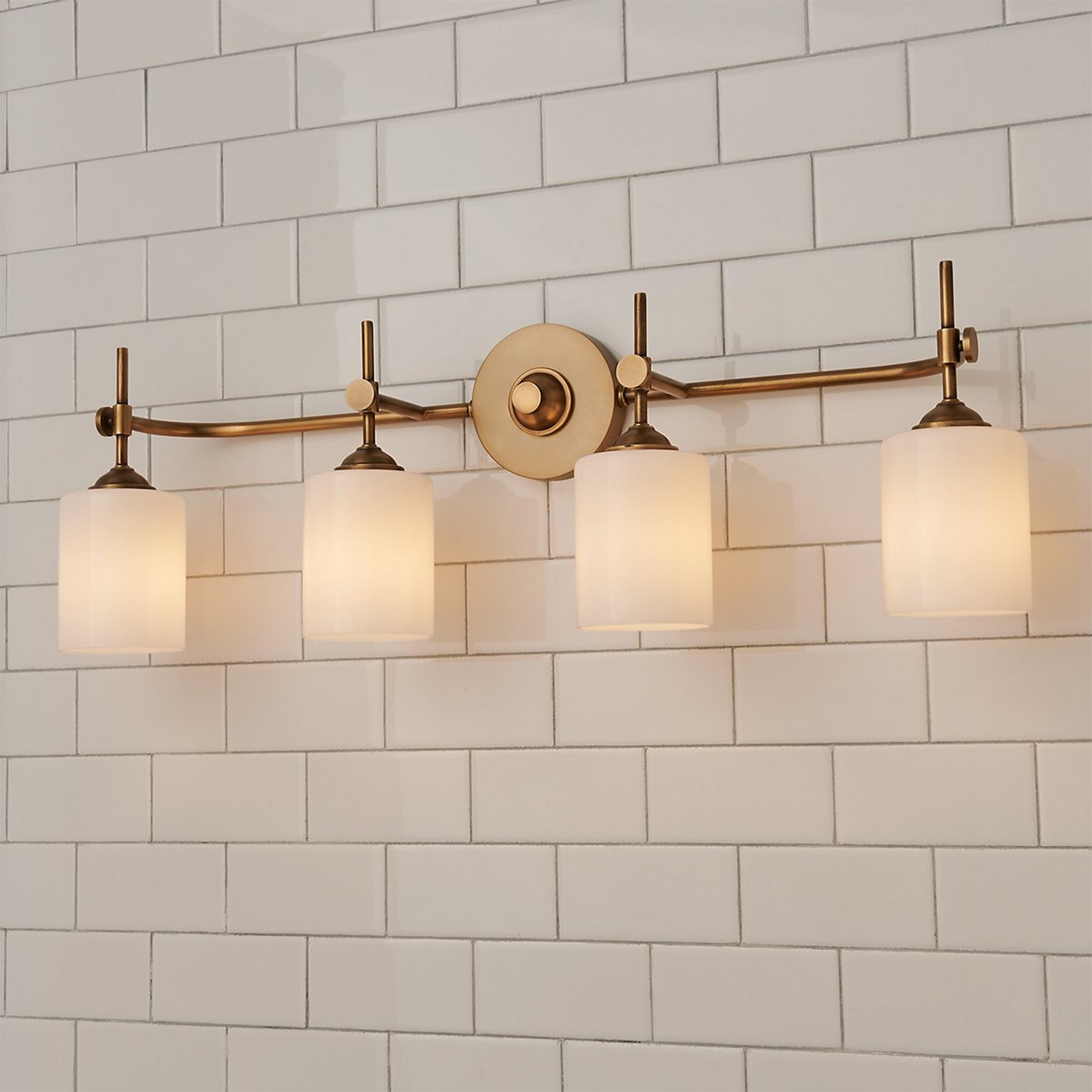 A Jerdora Opal Glass Vanity Light - 4 Light with Aged Brass / Opal Glass color