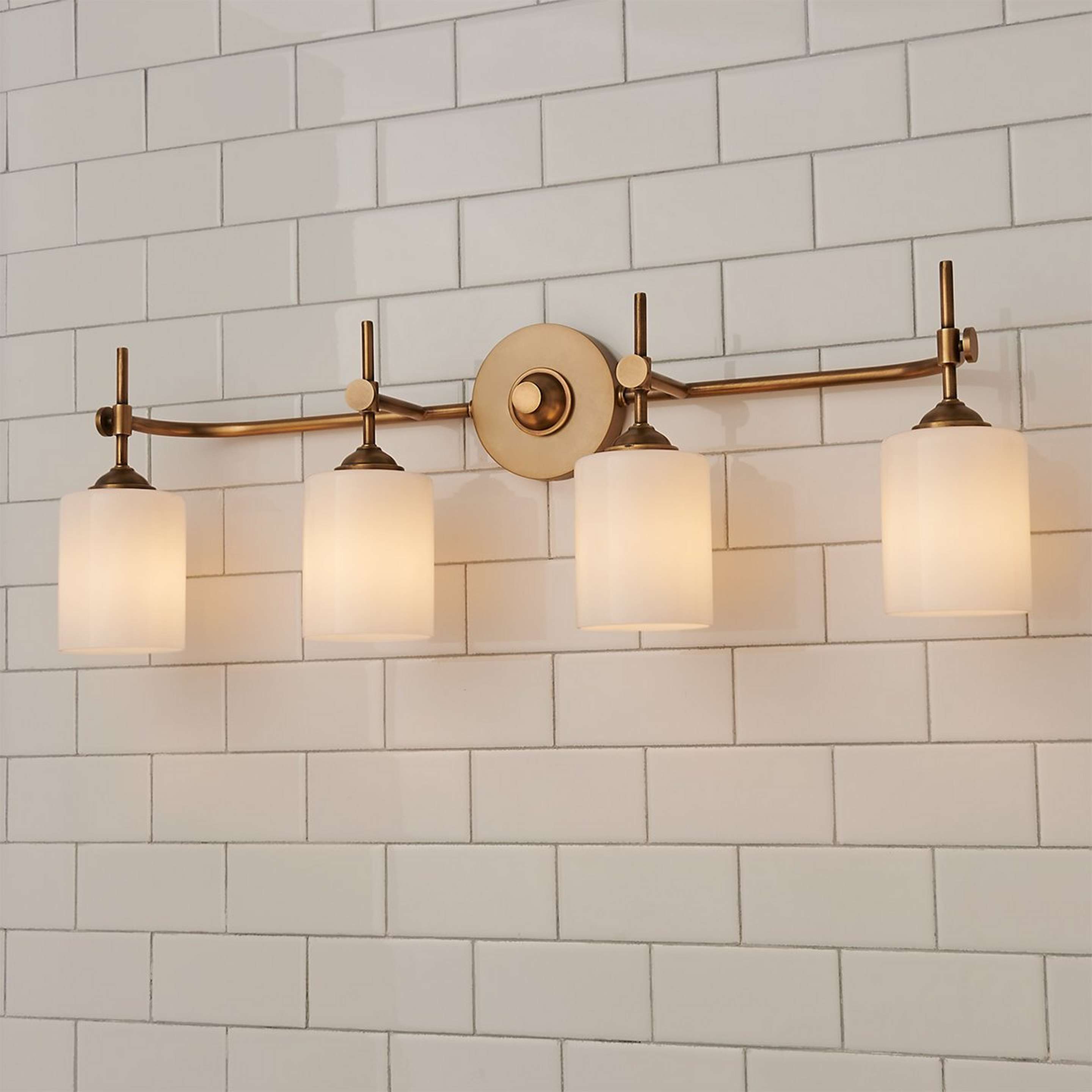 A Jerdora Opal Glass Vanity Light - 4 Light with Aged Brass / Opal Glass color