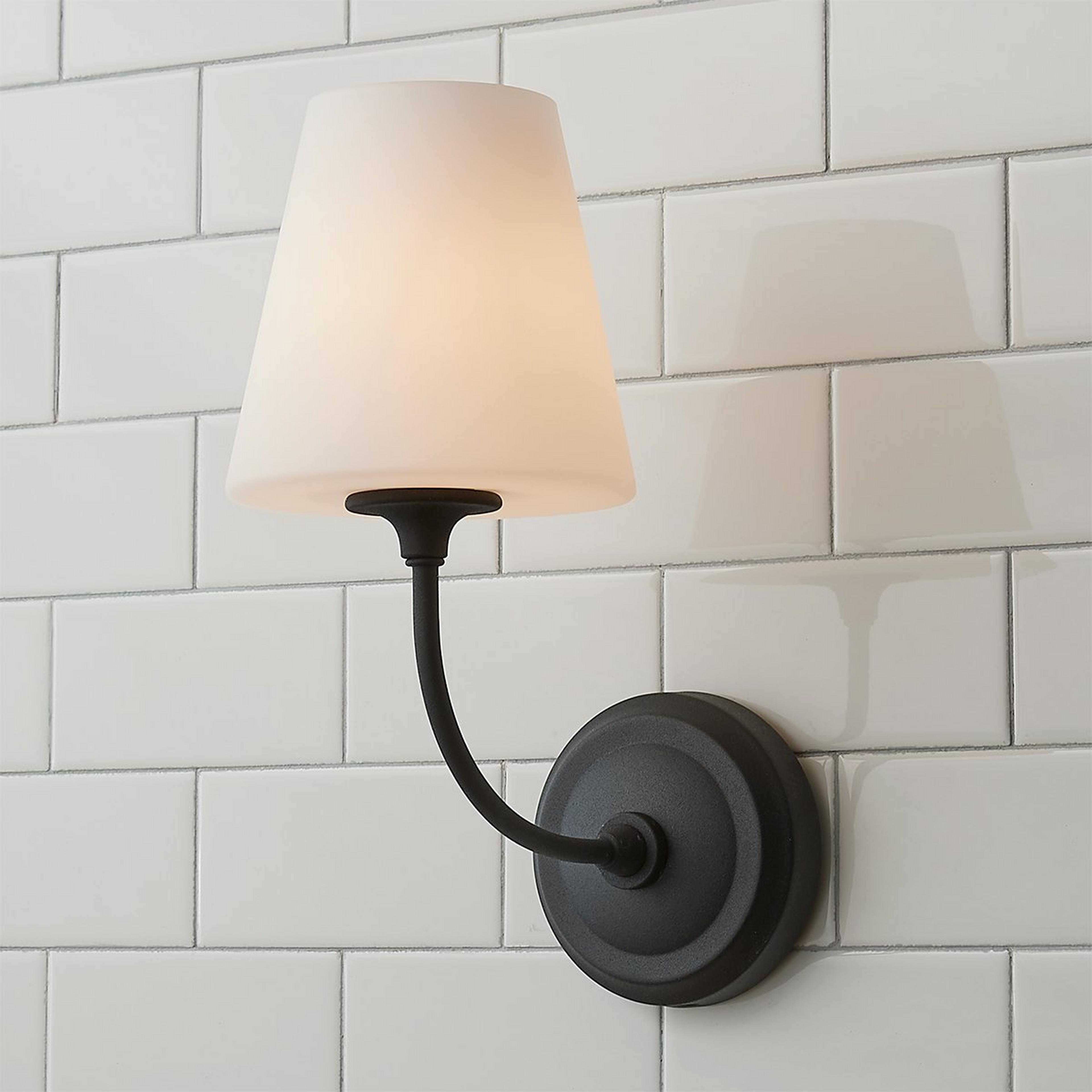 A Modern Charleston Bath Sconce with Forged Black / Milk Glass color