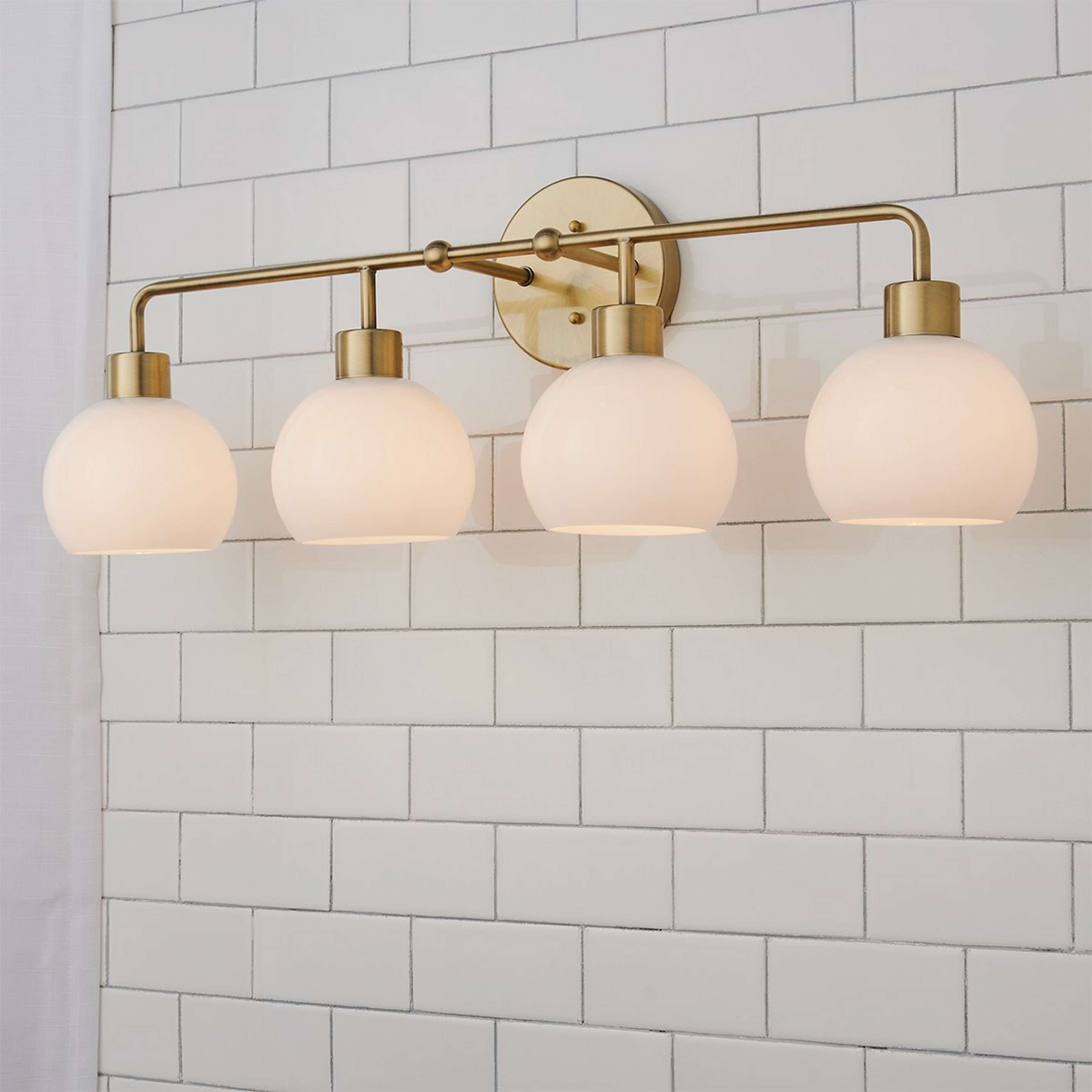 A Young House Love Opal Glass Bubble Vanity Light - 4 Light with Brass / Opal Glass color