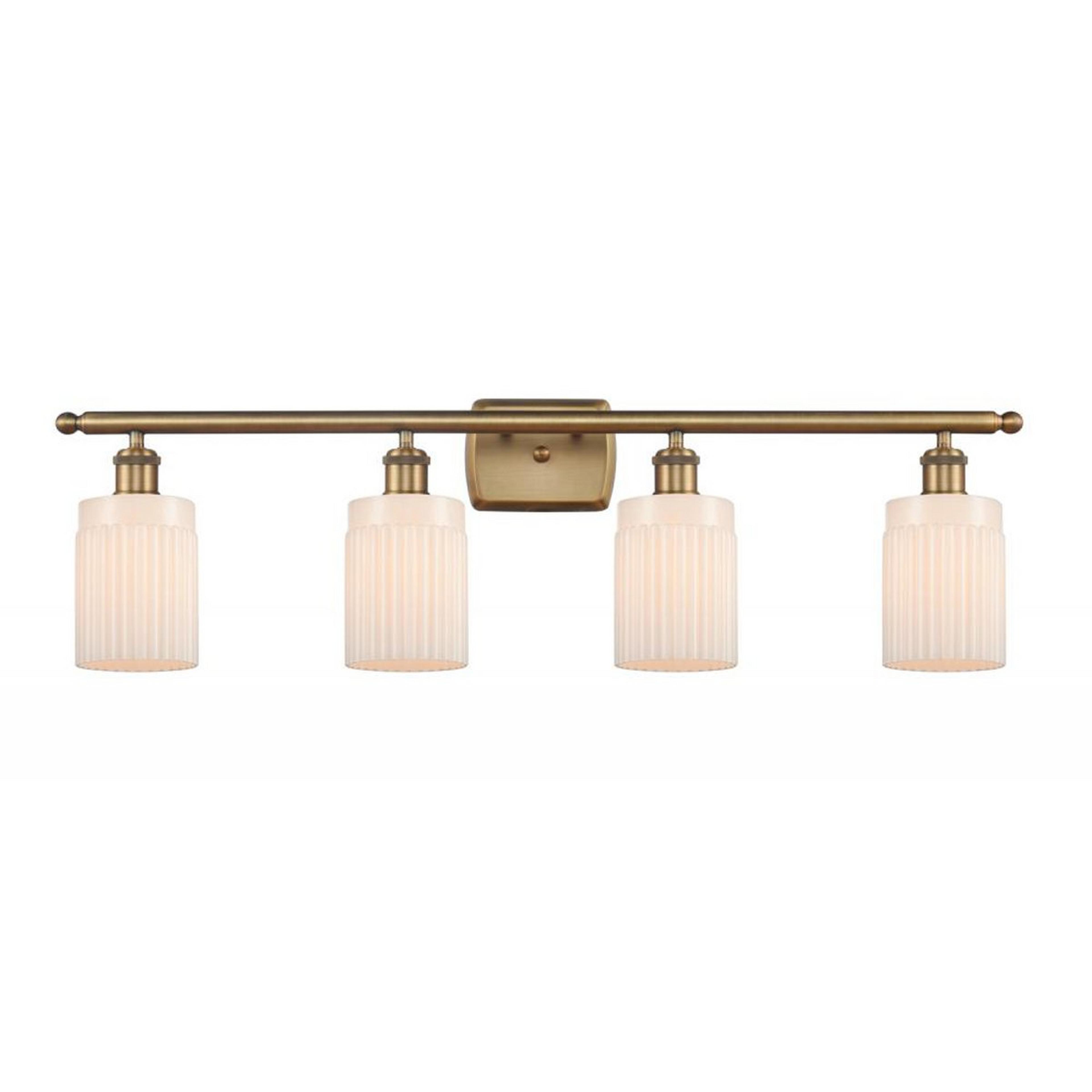 A Ridged Austin Vanity Light - 4 Light with Brushed Brass / Opal Glass color