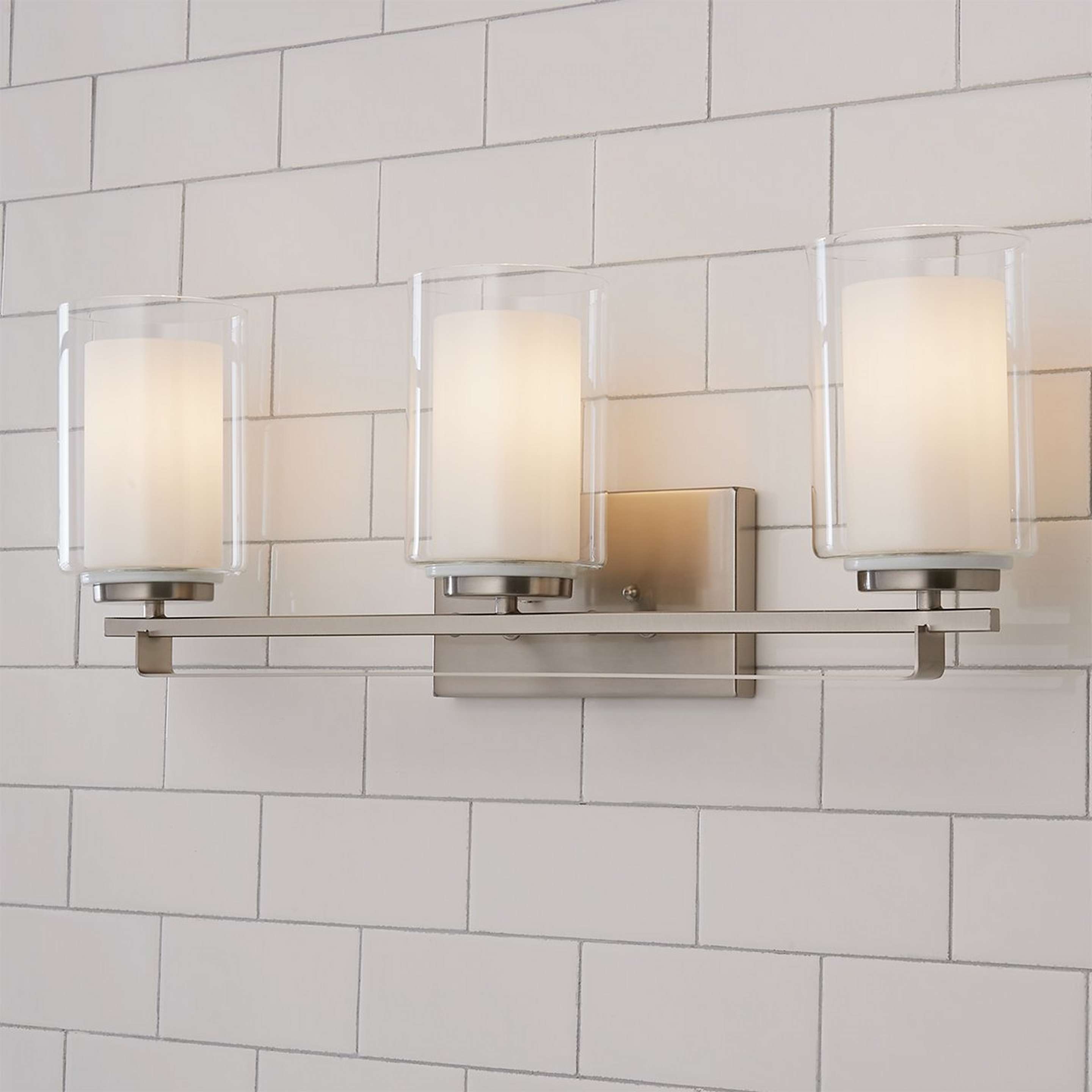 A Lydia Vanity Light - 3 Light with Brushed Nickel / White / Clear color