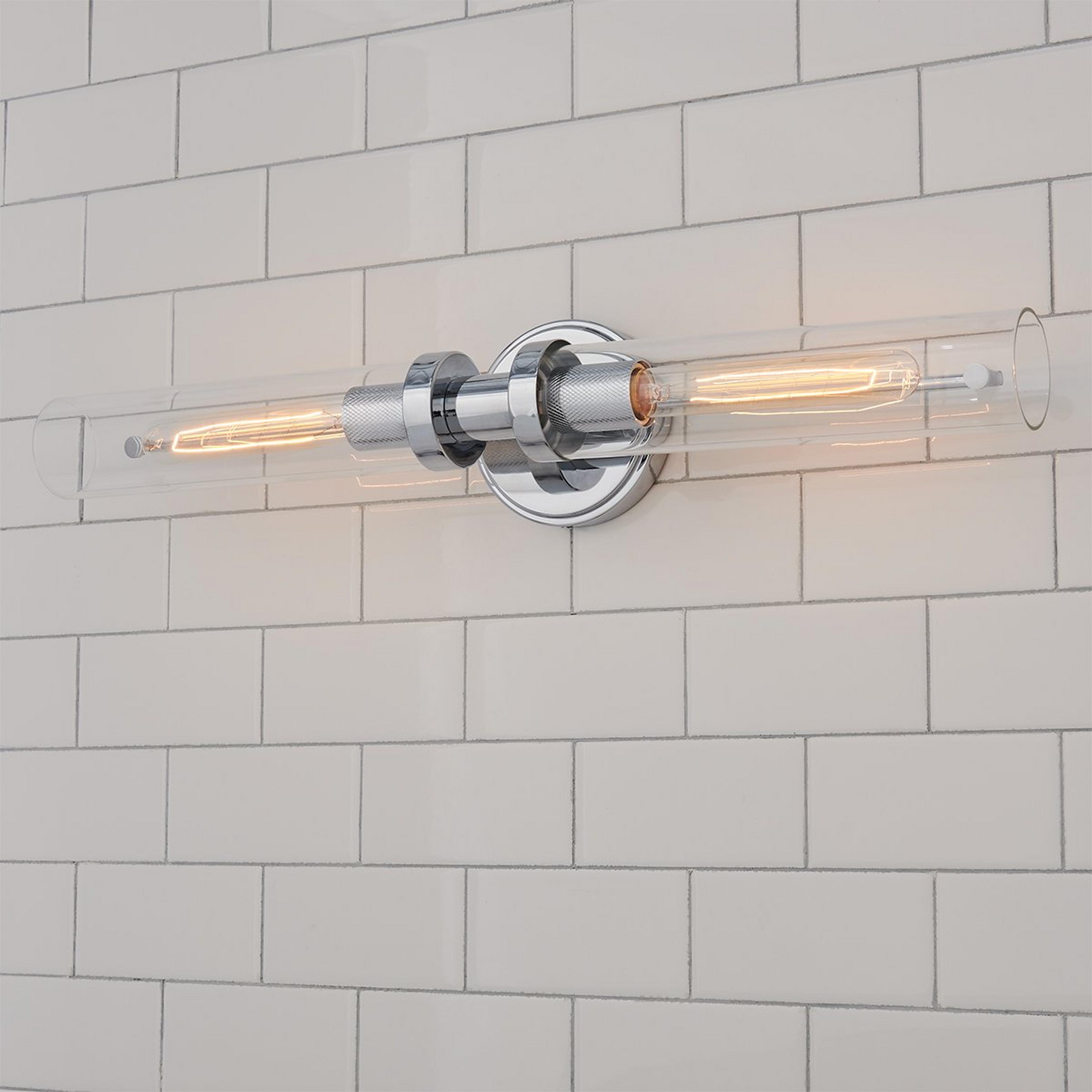 A Daphne Vanity Light with Chrome / Clear Glass color