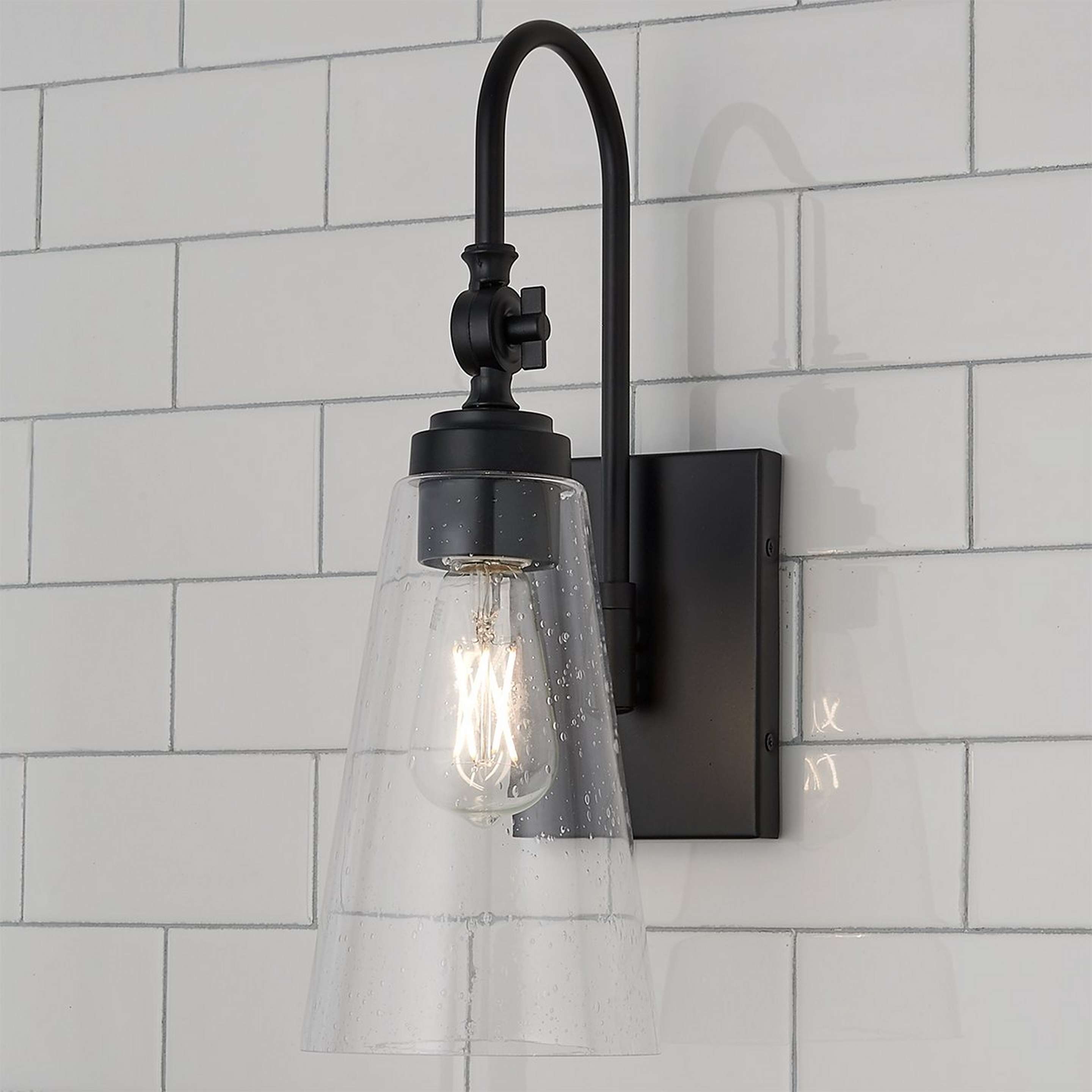 A Arched Neck Tapered Glass Wall Light with Black / Seeded Glass color