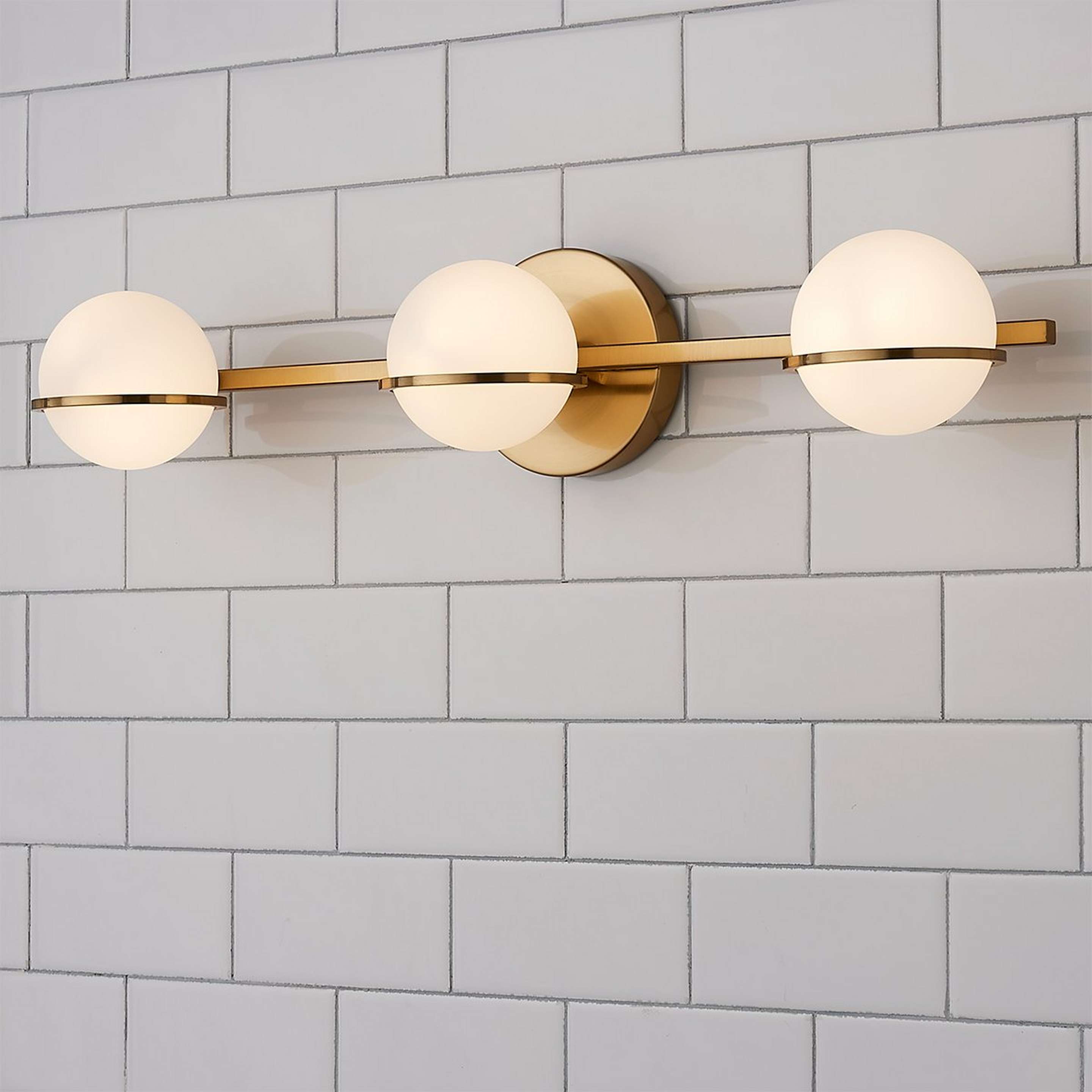 A Dario Vanity Light - 3 Light with Aged Brass / White Opal Glass color