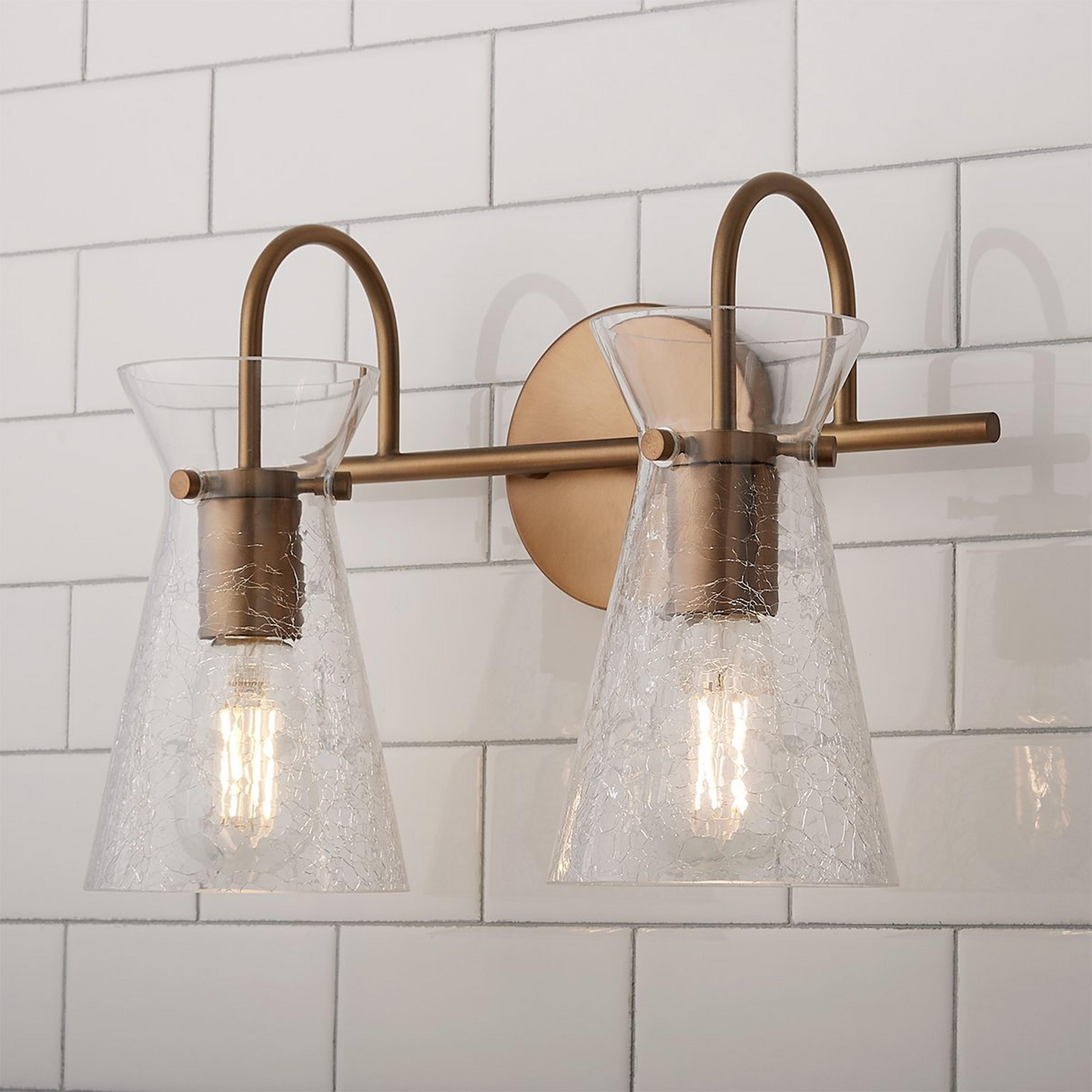 A Leo Vanity Light - 2 Light with Aged Brass / Seedy Glass color