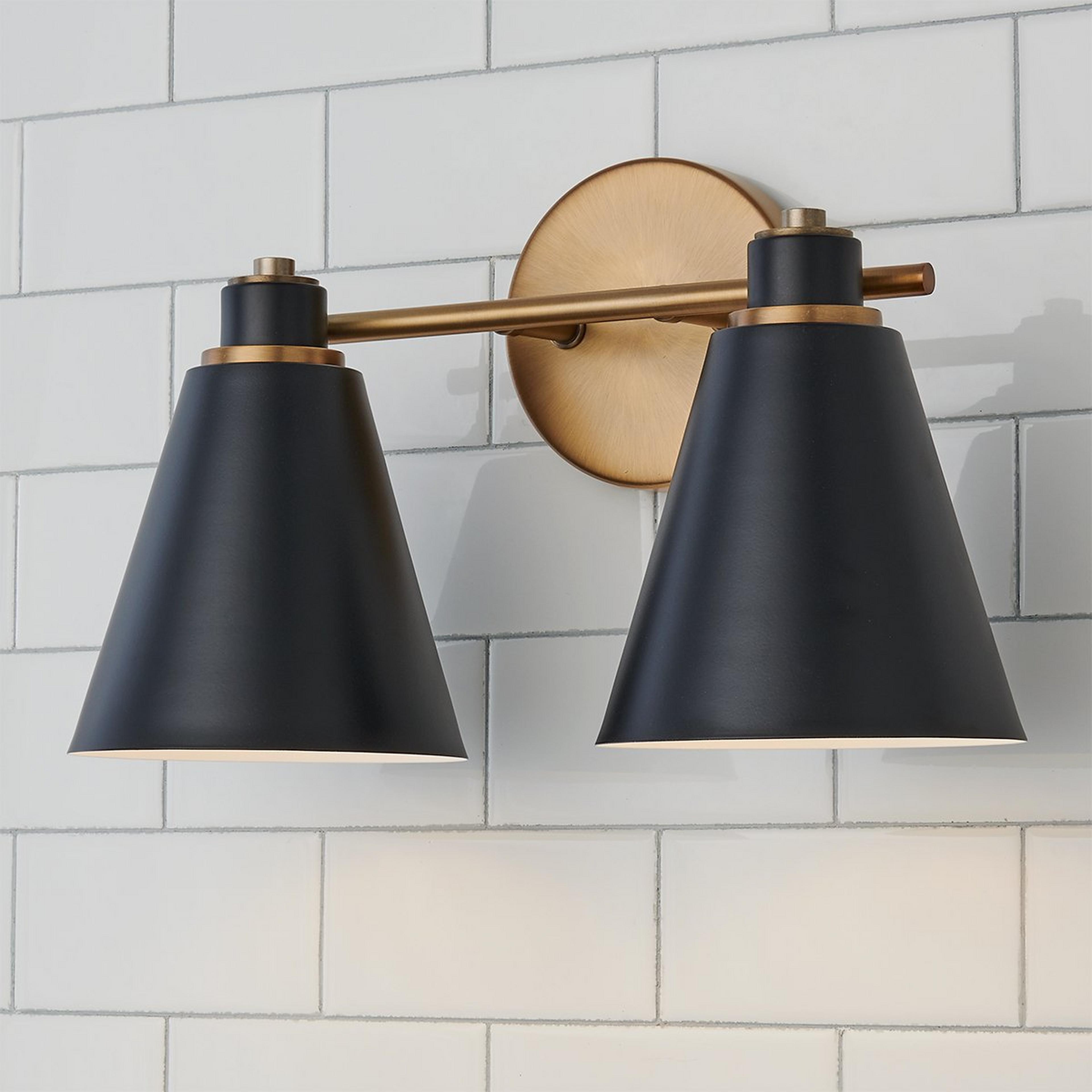 A Jenovia Vanity Light - 2 Light with Aged Brass / Black color