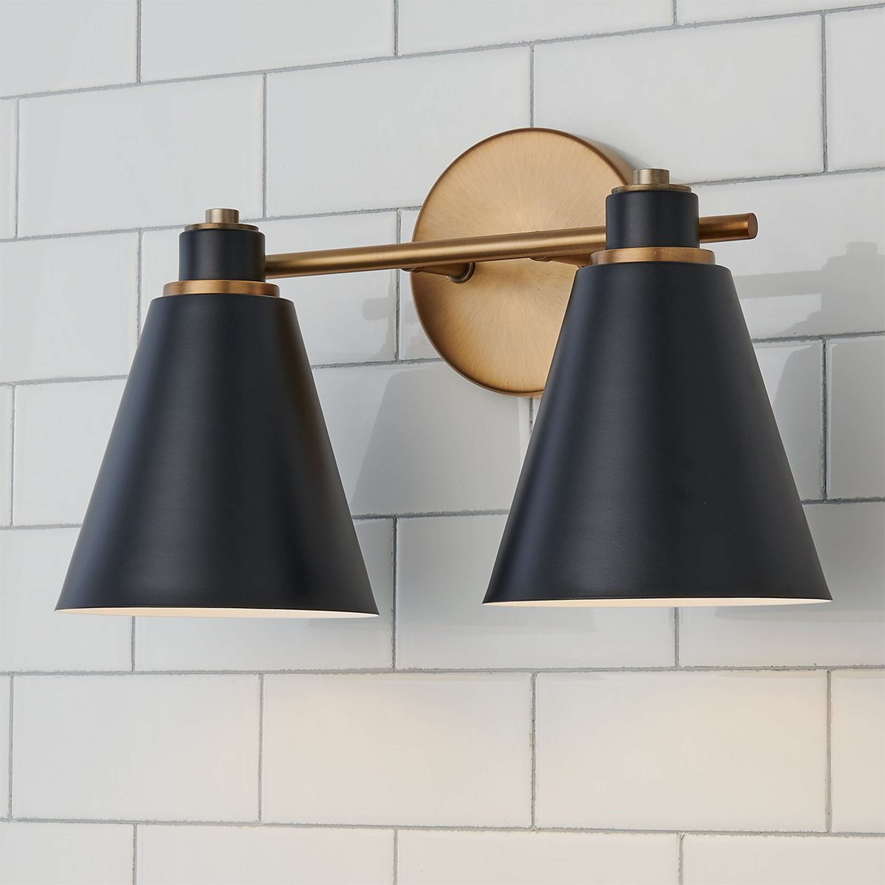 A Jenovia Vanity Light - 2 Light with Aged Brass / Black color