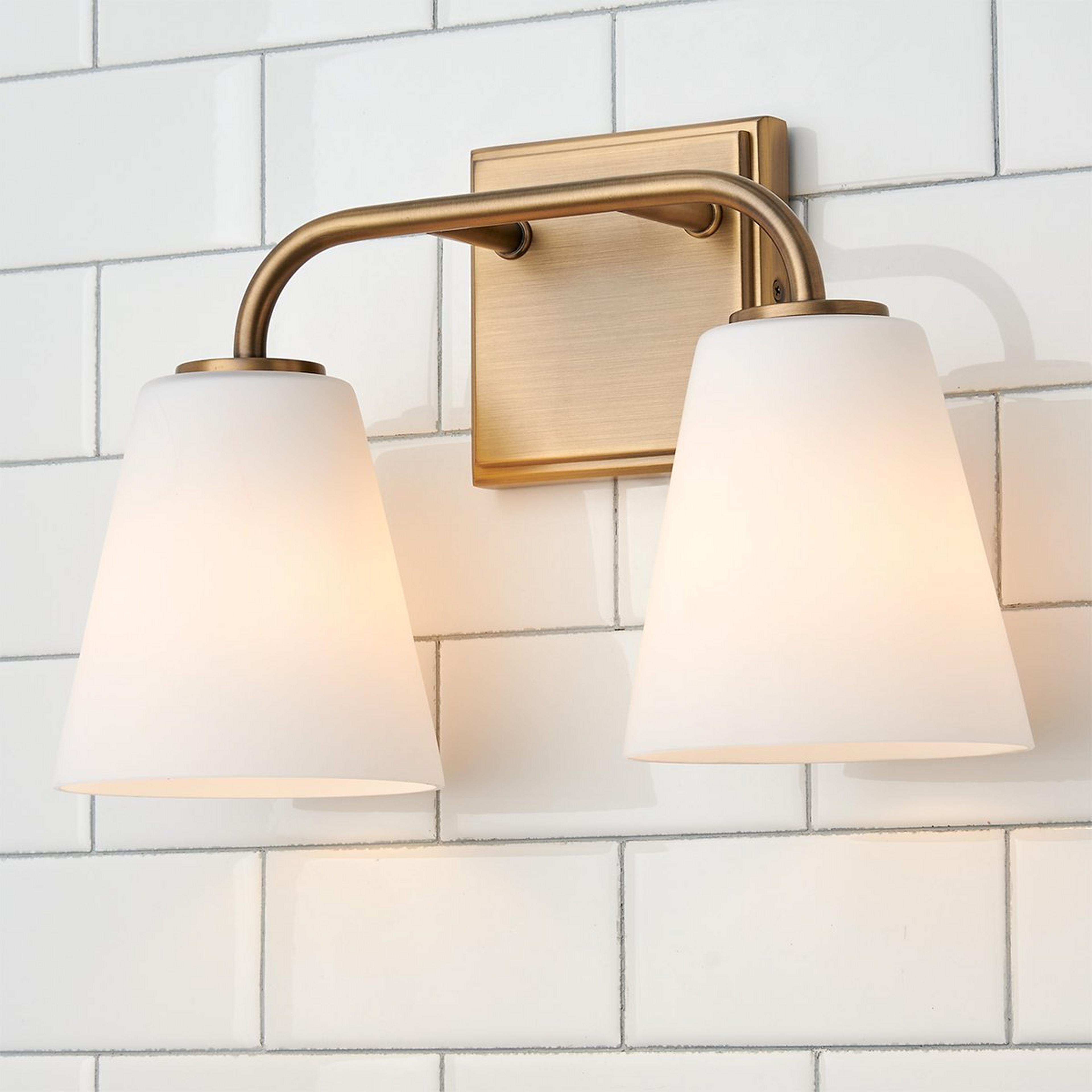 A Westchase Vanity Light - 2 Light with Aged Brass / Milk Glass color
