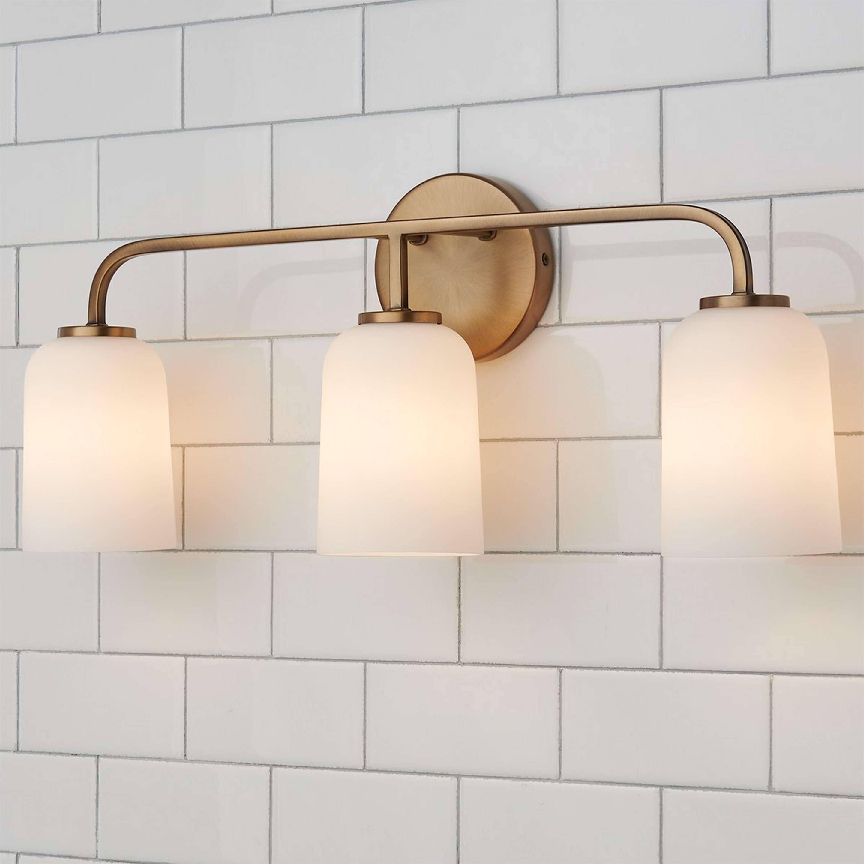A Verlice Vanity Light - 3 Light with Aged Brass / Milk Glass color
