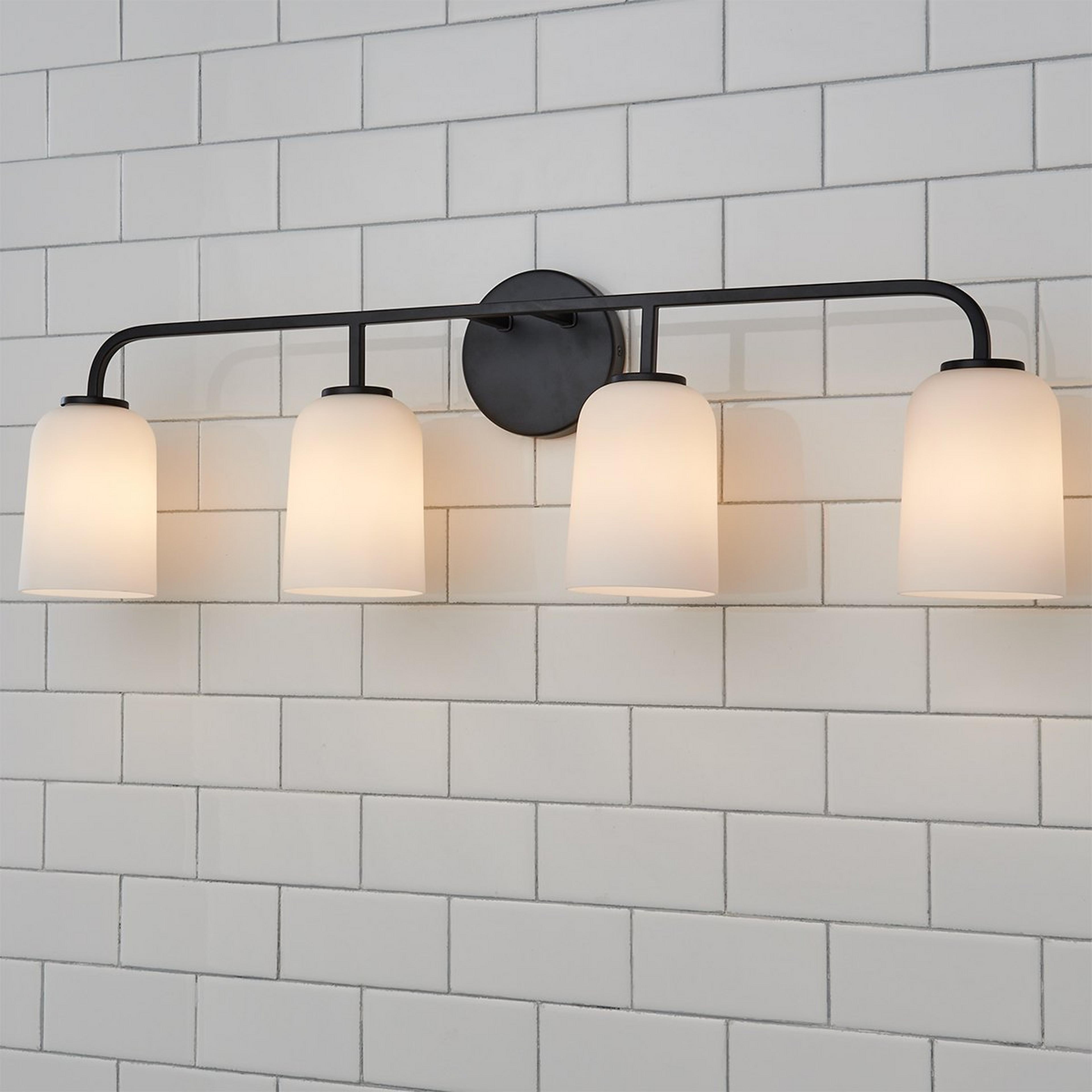 A Verlice Vanity Light - 4 Light with Matte Black / Milk Glass color