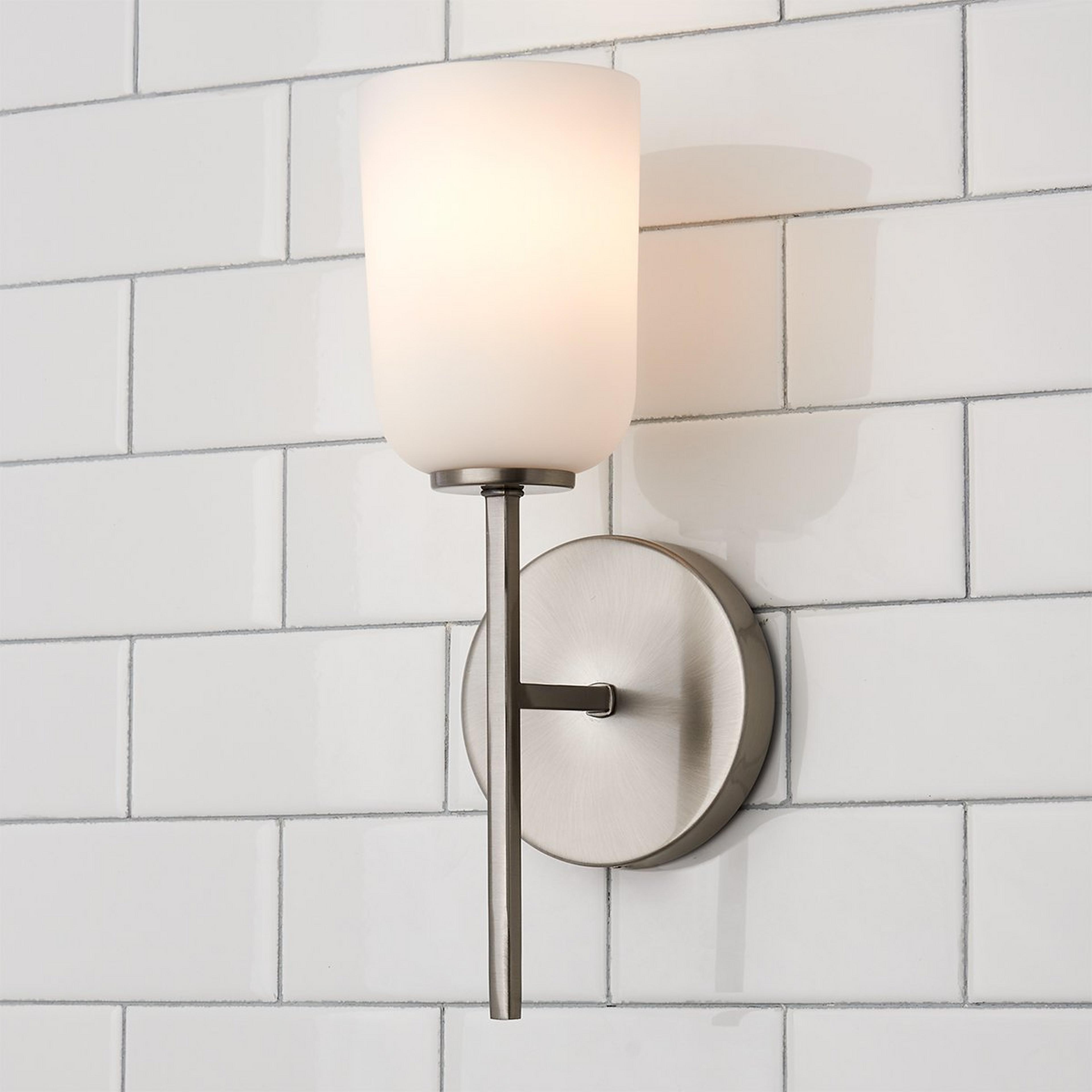 A Verlice Bath Sconce with Brushed Nickel / Milk Glass color