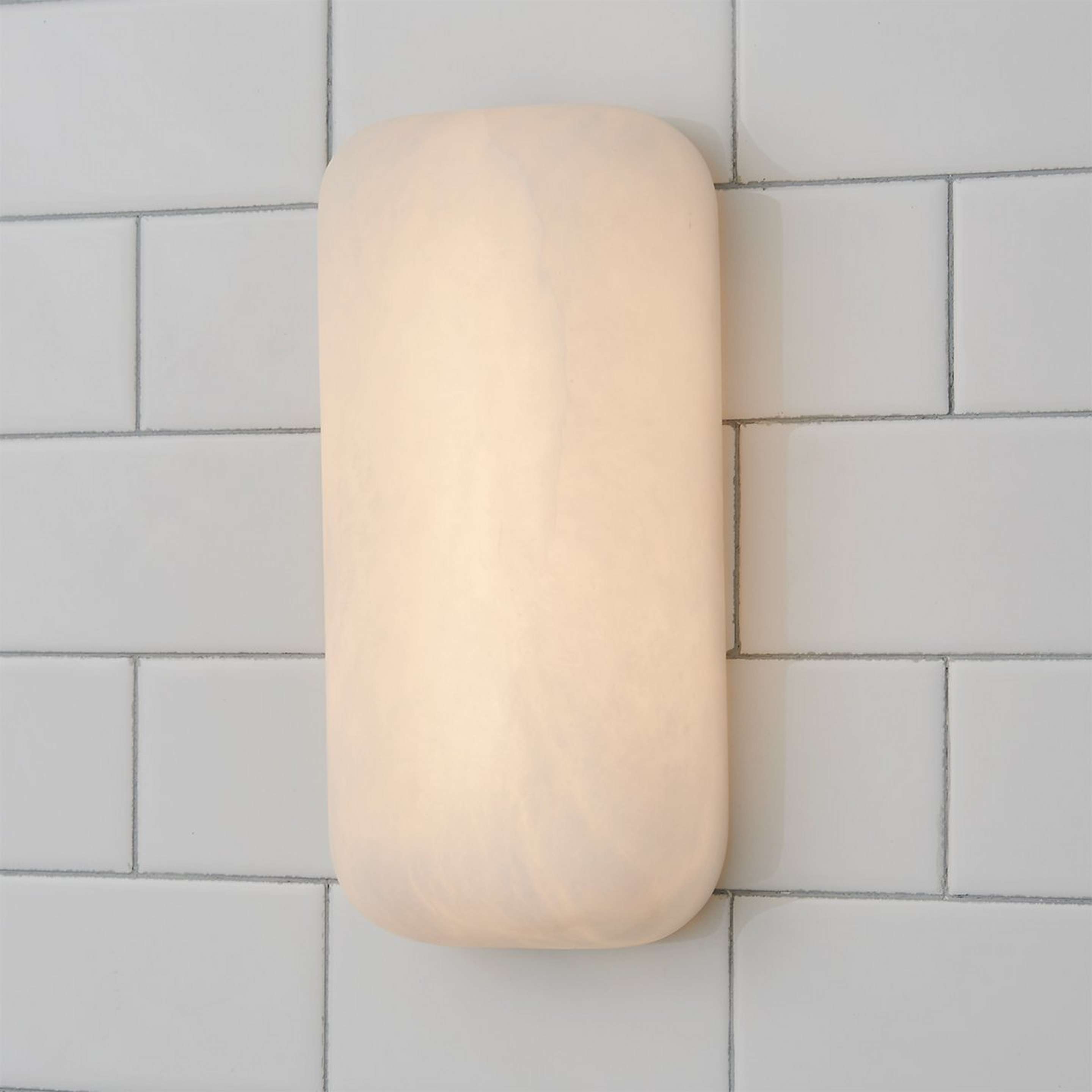 A Brecia LED Bath Sconce with Natural Alabaster color