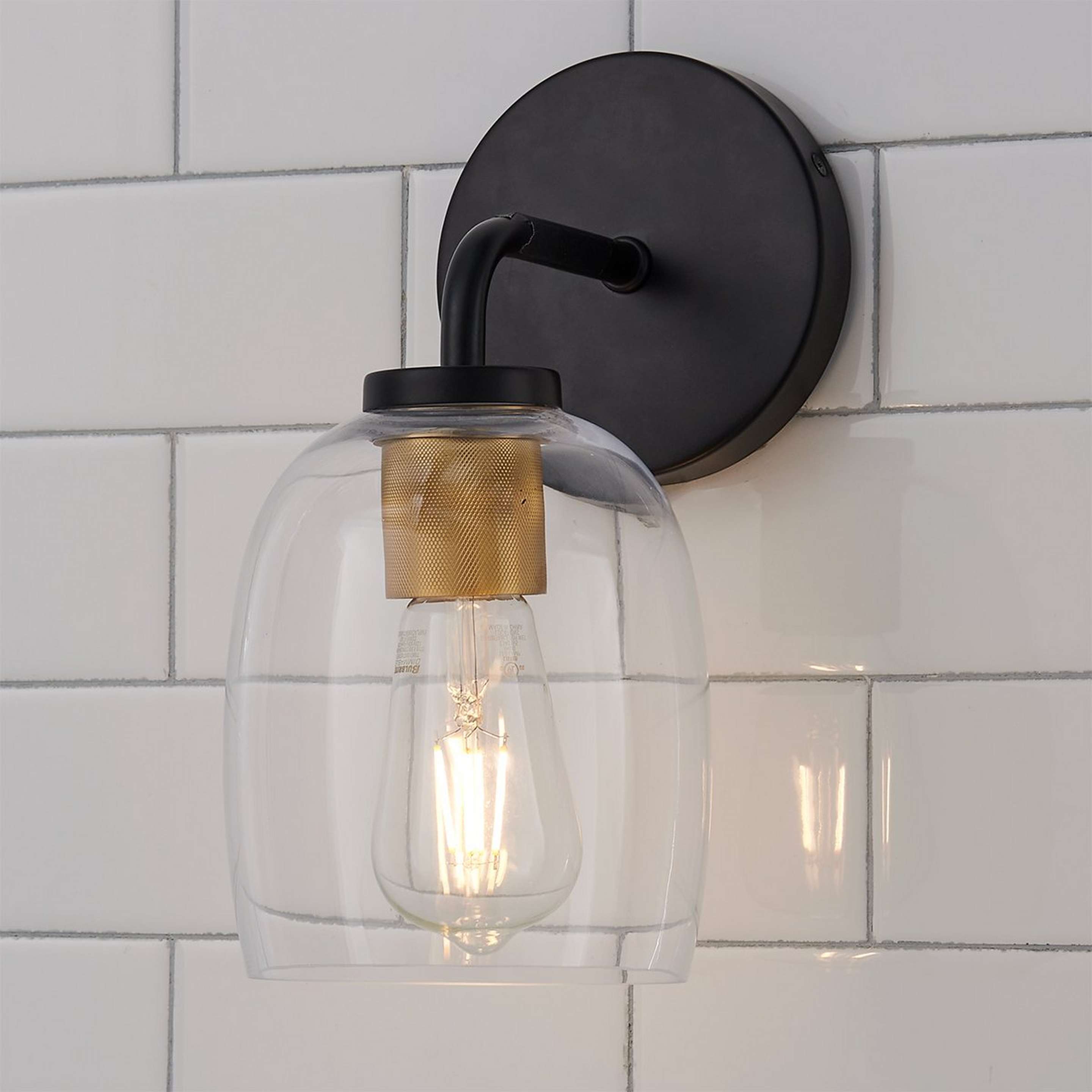 A Laura Bath Sconce with Black / Brass / Clear Glass color