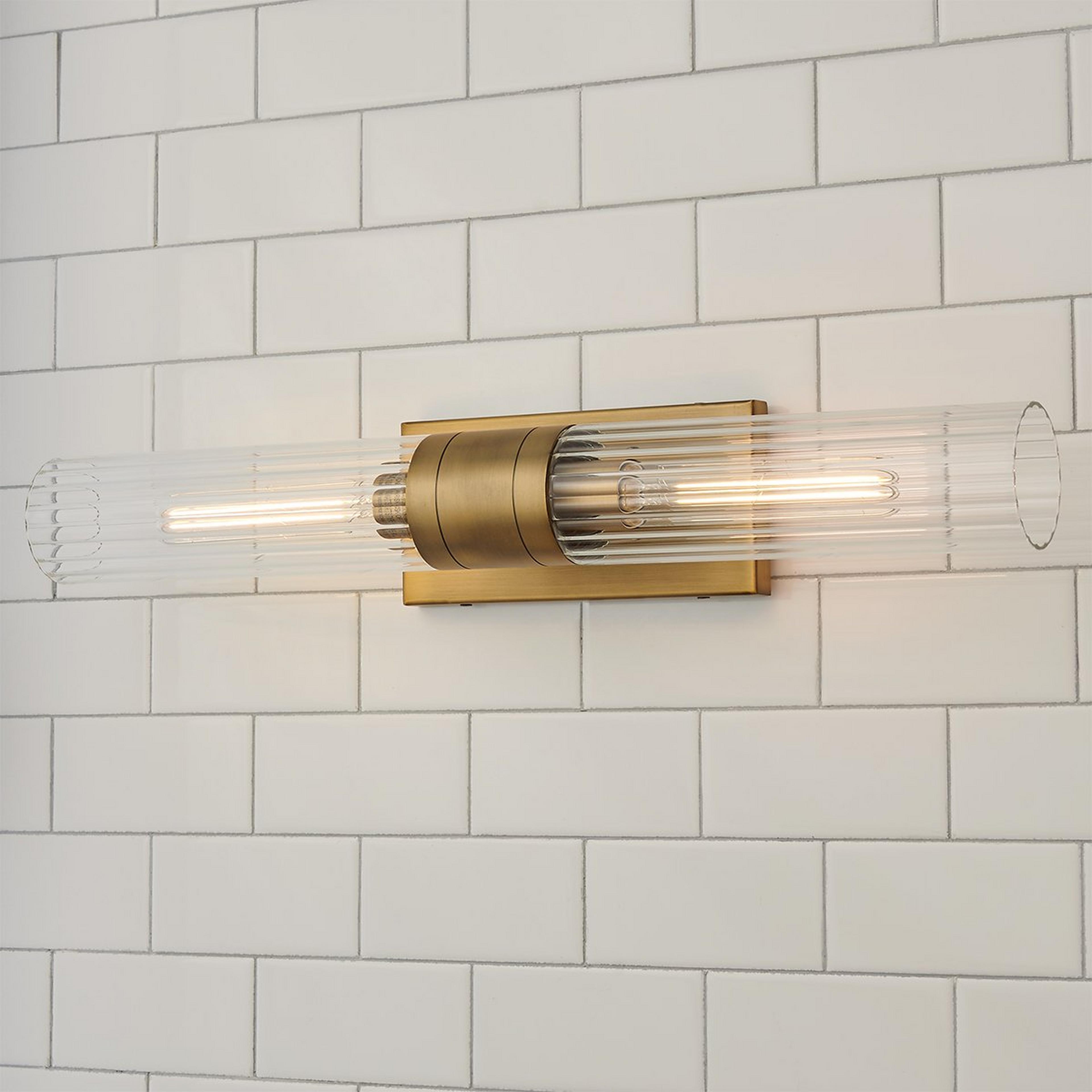 A Malika Clear Glass Bath Sconce - 2 Light with Brushed Brass / Clear Glass color