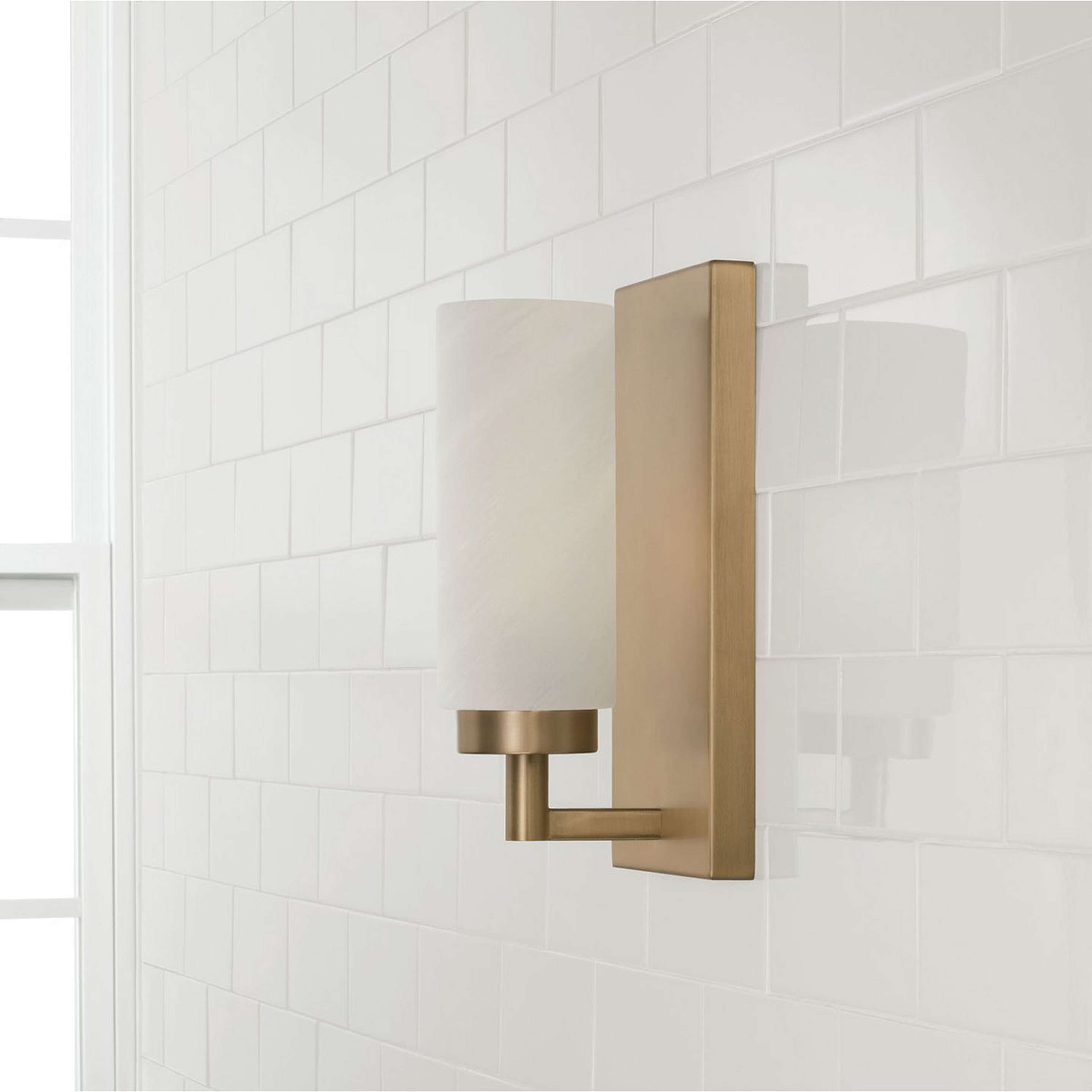 A Aeolian Bath Sconce - 1 Light with Aged Brass / Faux Alabaster Glass color
