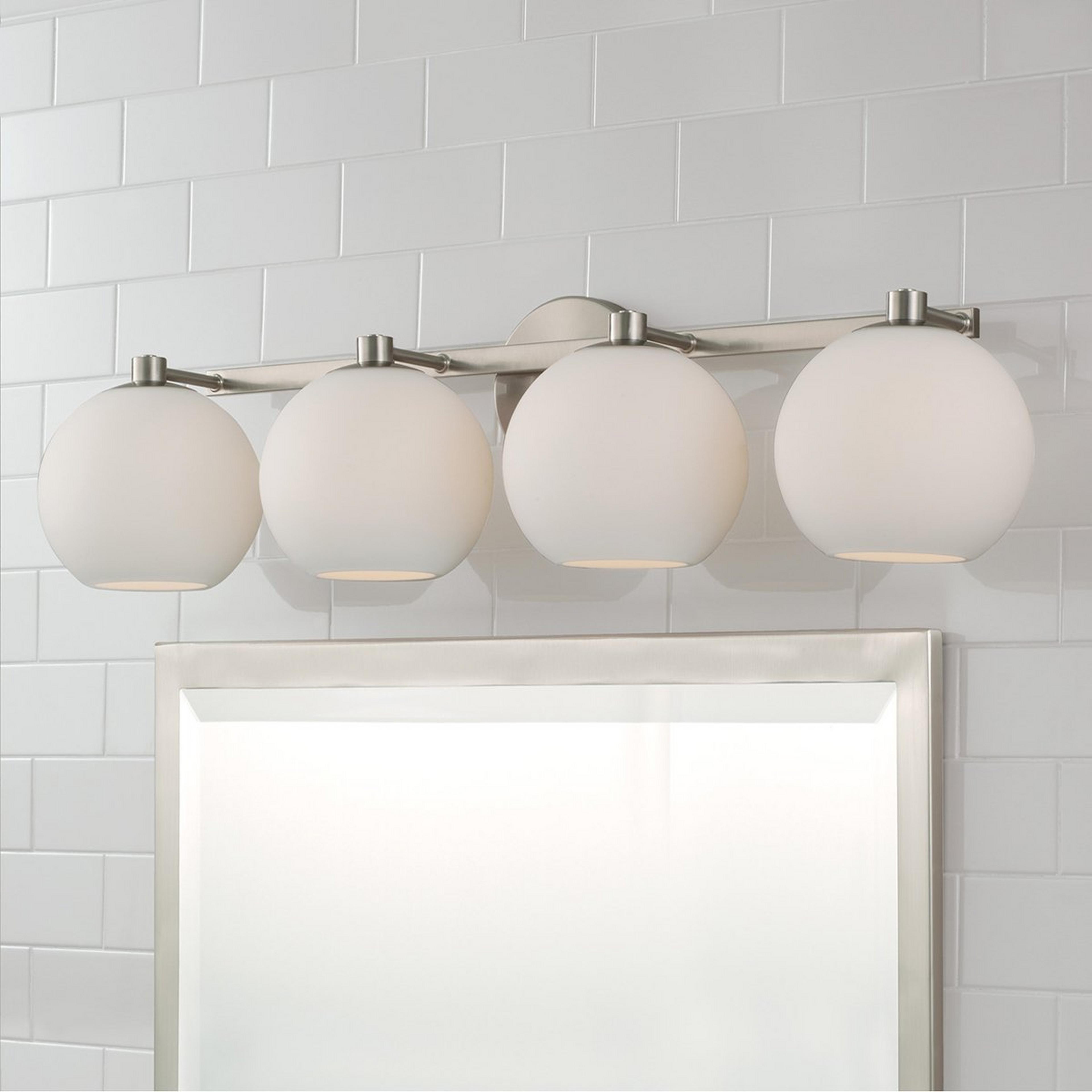 A Coda Vanity Light - 4 Light with Brushed Nickel / White Glass color