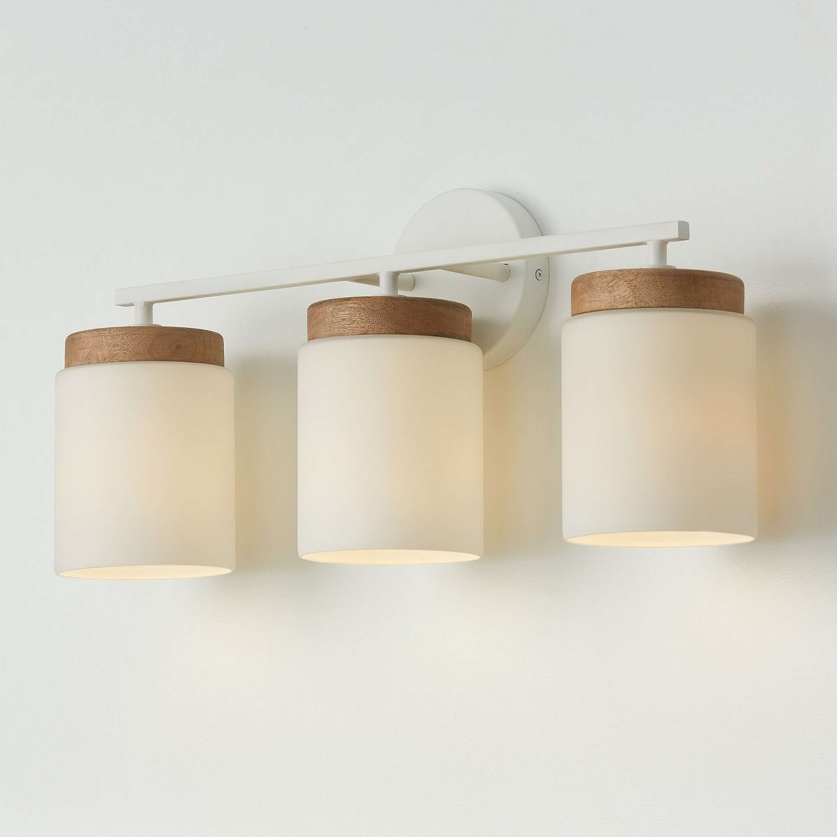 A Wood Capped Vanity Light - 3 Light with White / Mango Wood color