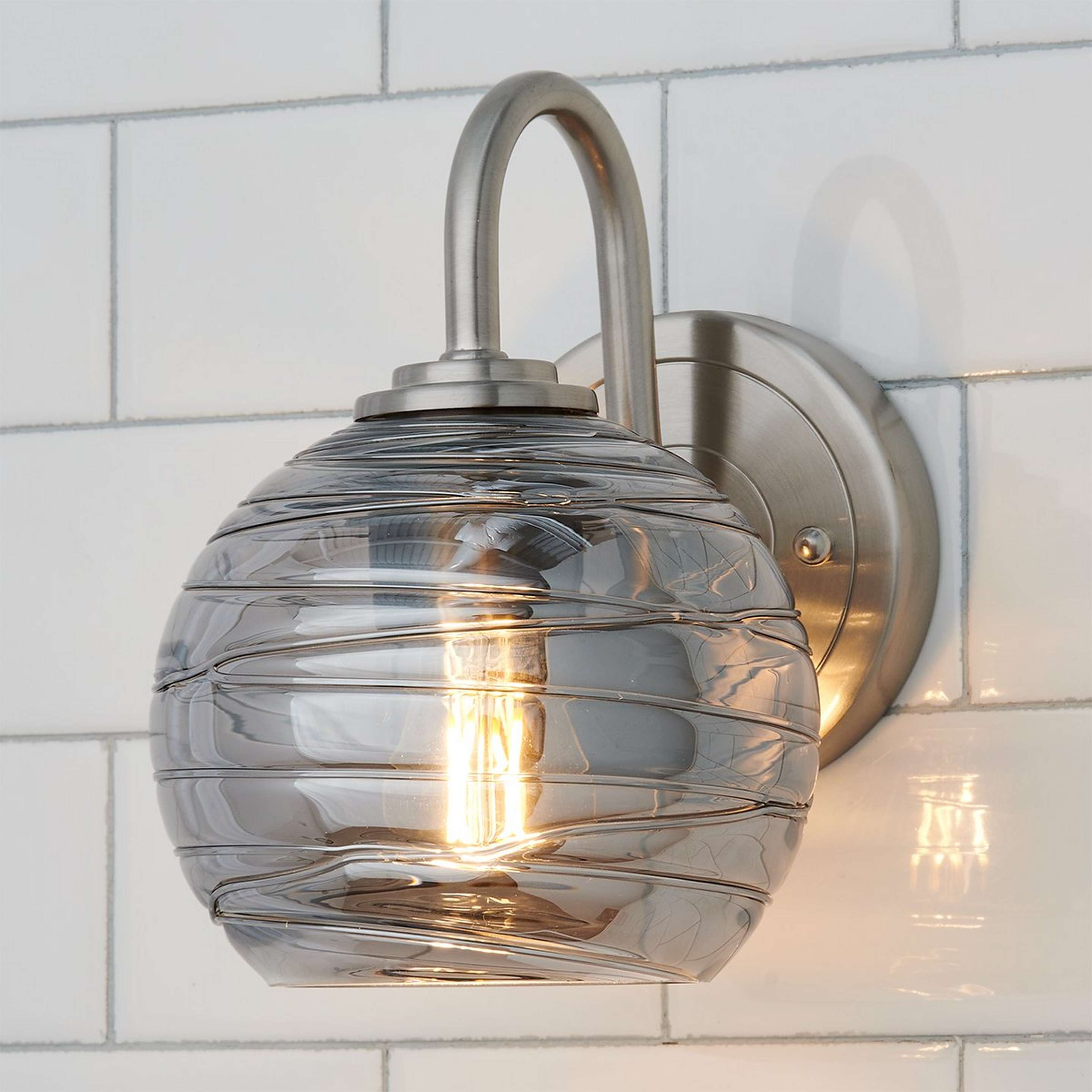 A Danza Bath Sconce with Satin Nickel / Smoked Glass color