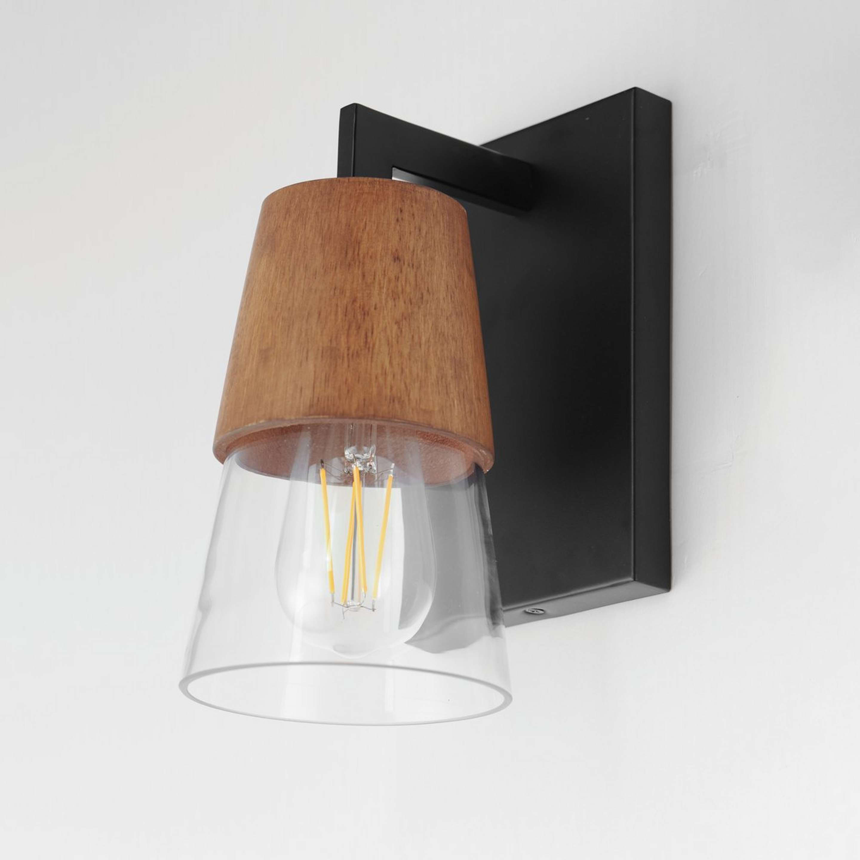 A Rockmore Bath Sconce with Black / Wood / Clear Glass color