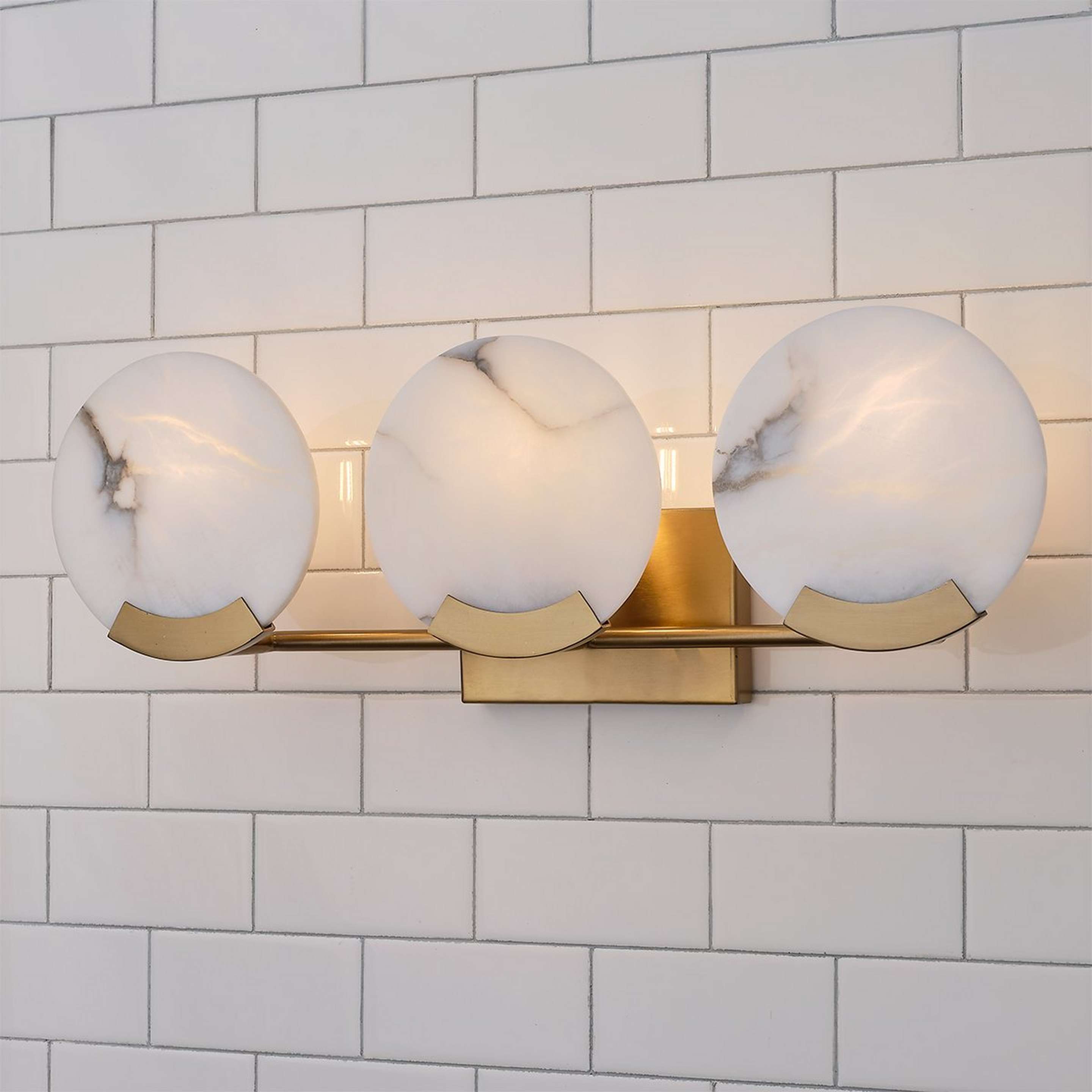 A Balasa Vanity Light with Brass / Natural Alabaster color