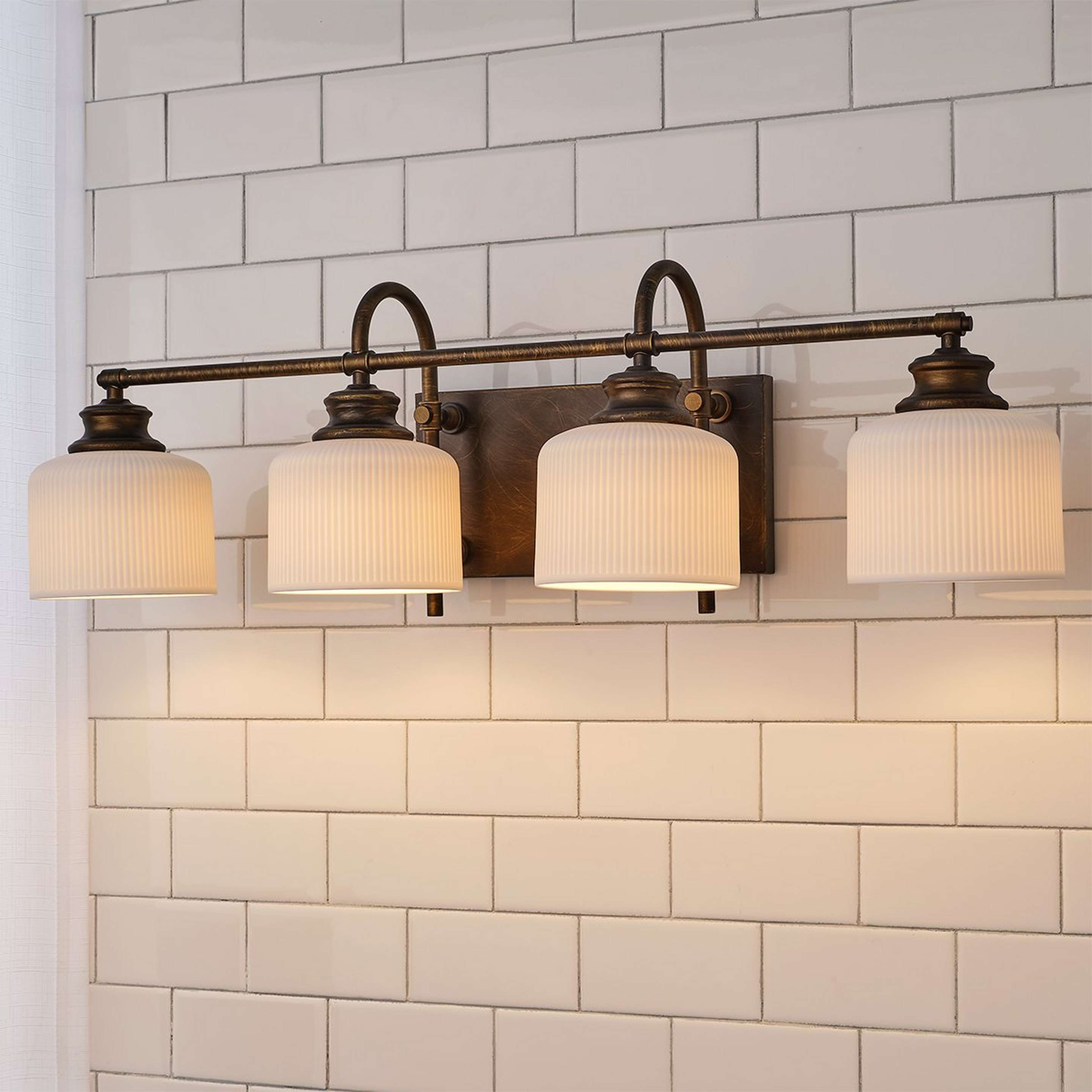 A Cherisa Vanity Light - 4 Light with Oil Rubbed Bronze / Opal Glass color