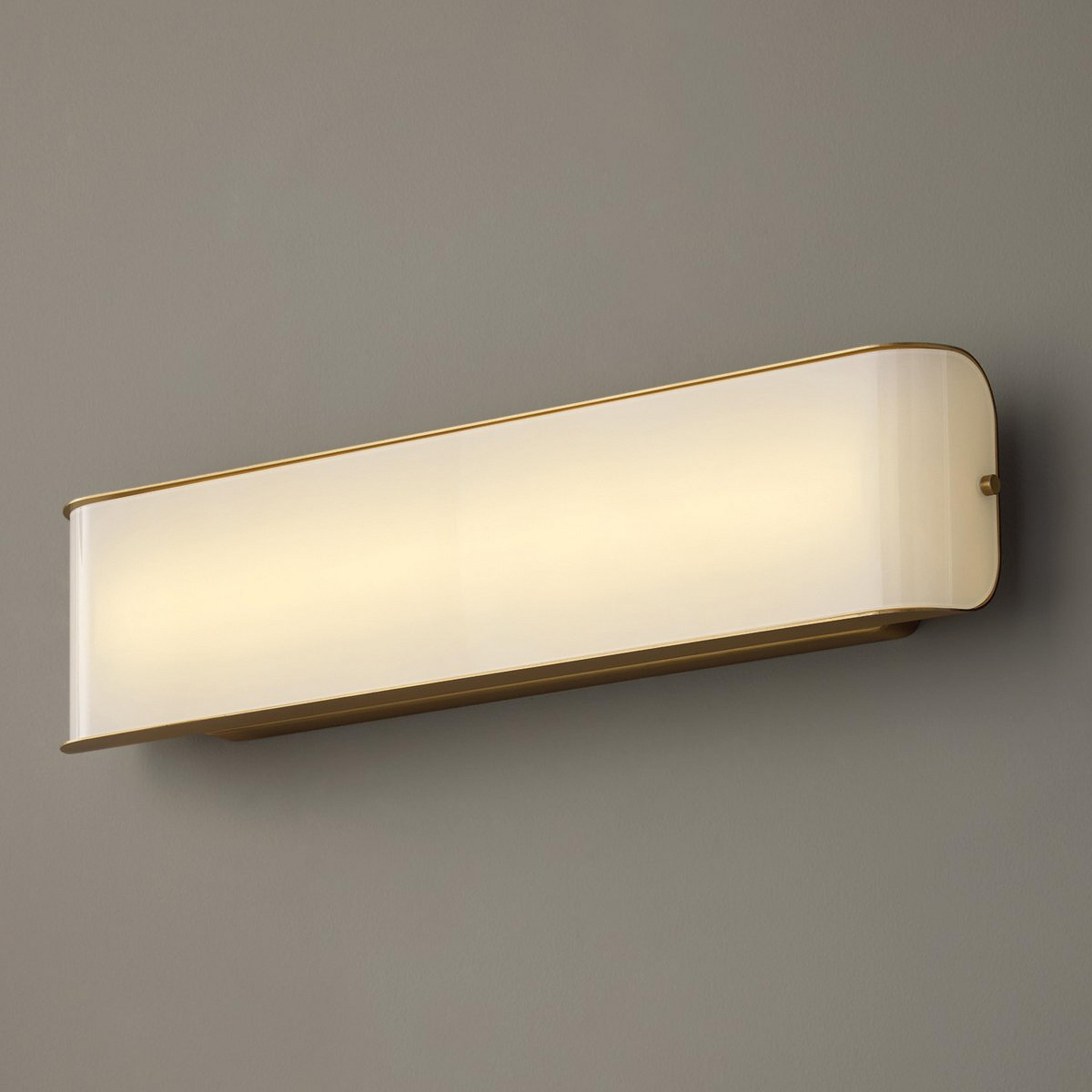 A Nous LED Vanity Light with Aged Brass / Opal Glass color