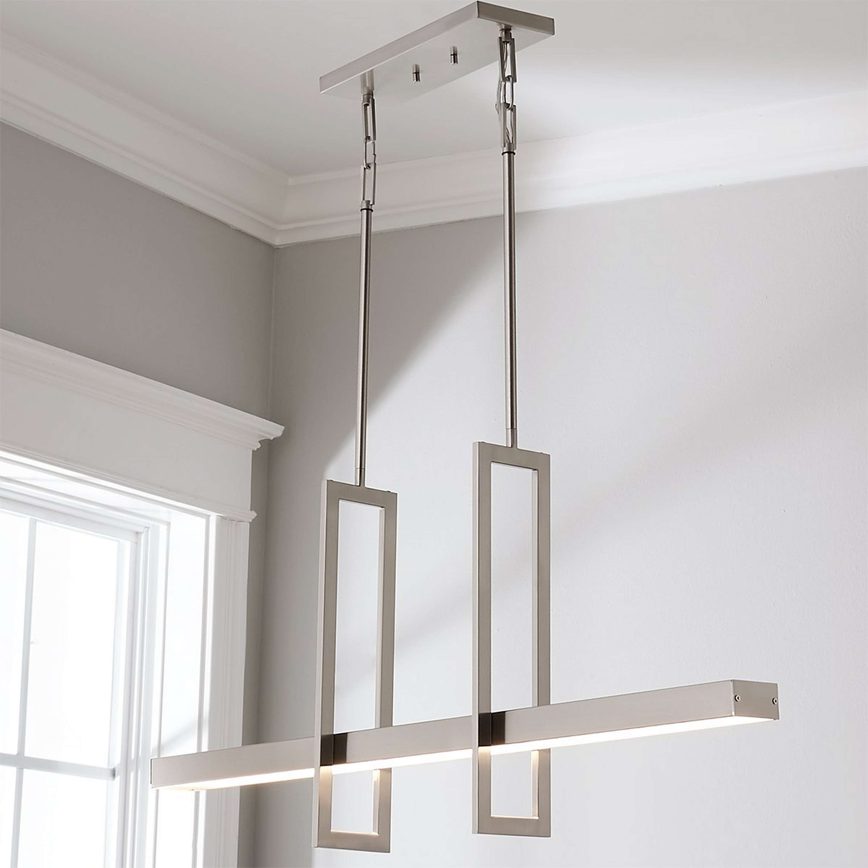 A Modern Balance Beam LED Island Chandelier with Brushed Nickel color