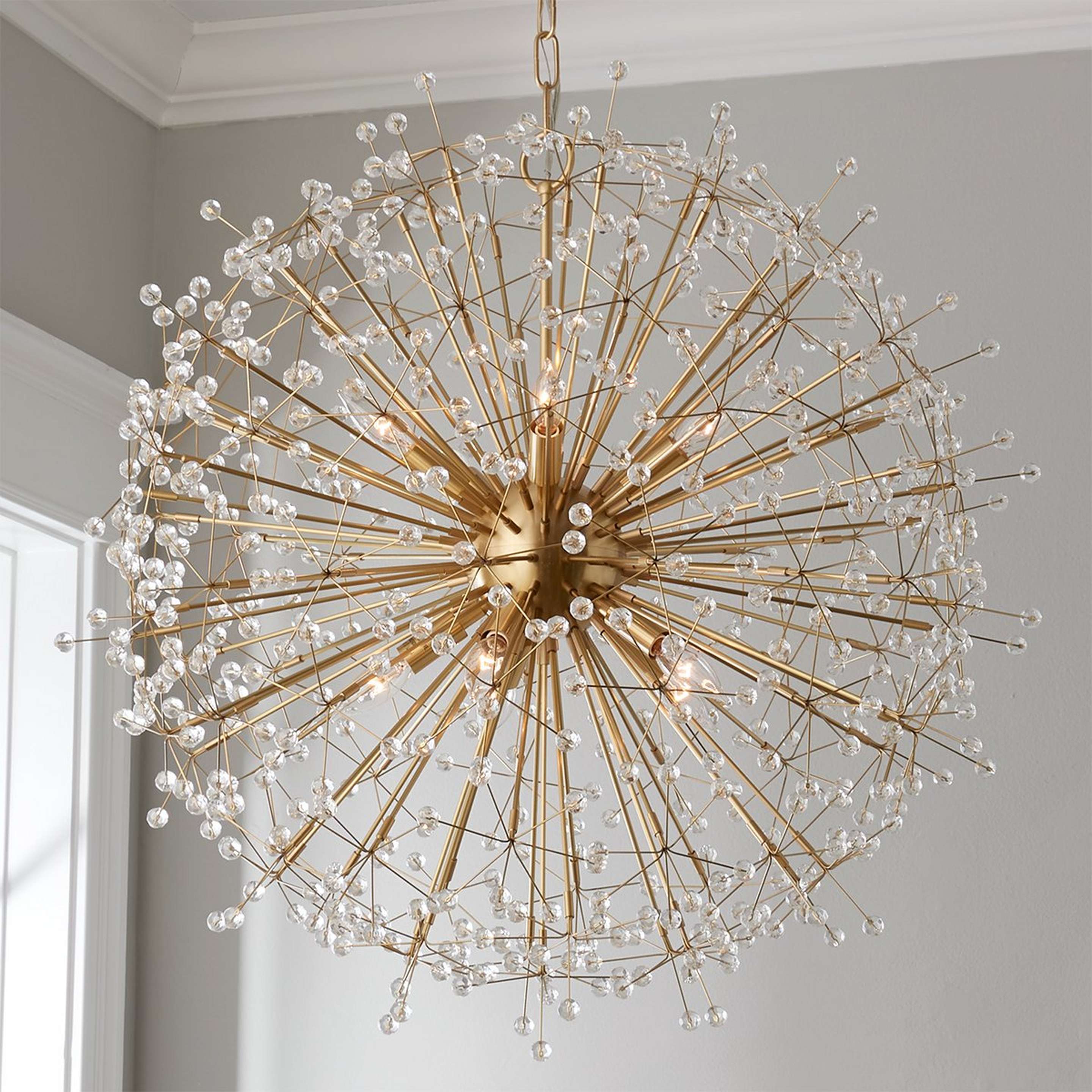 A Crystal Dandelion Chandelier - Large with Aged Brass color