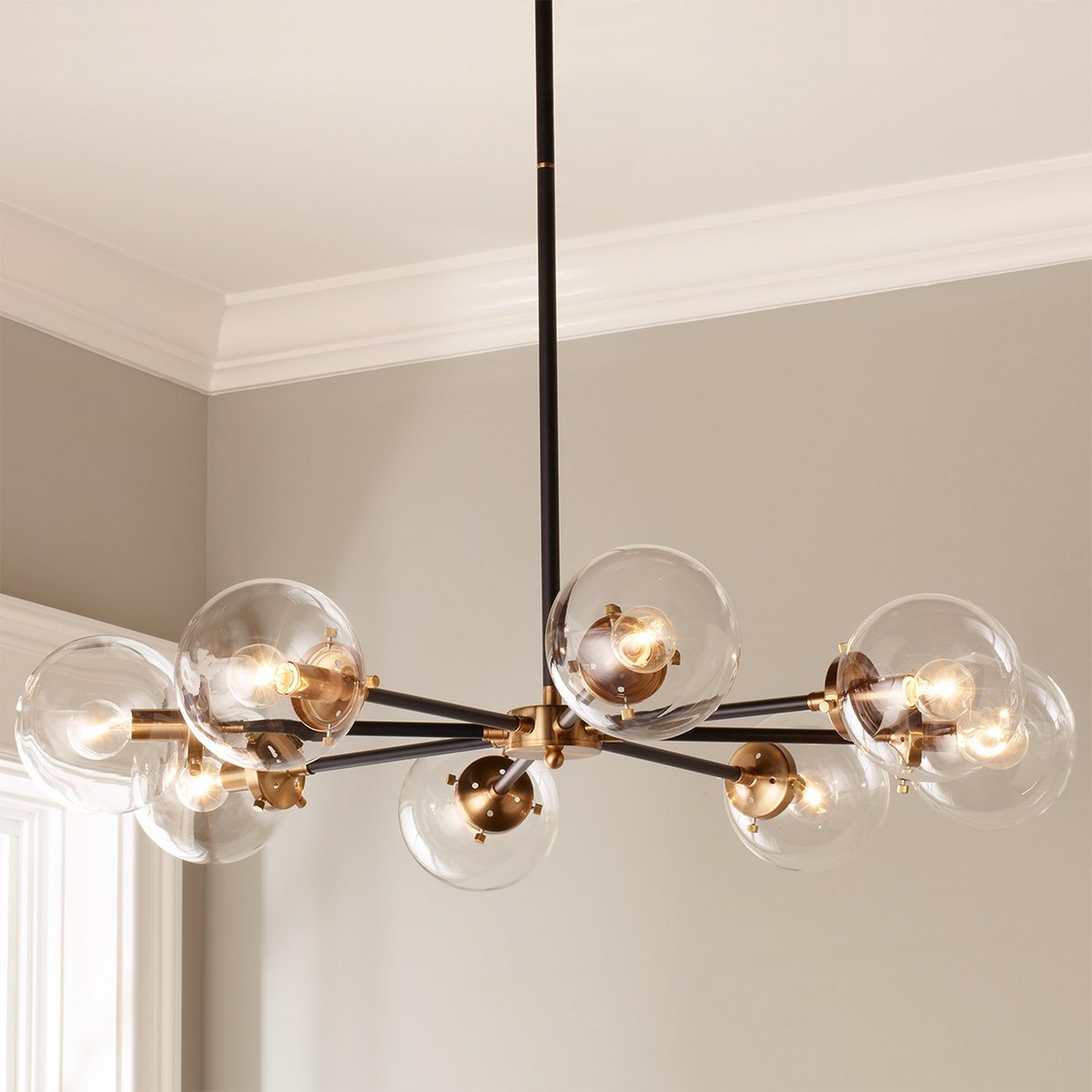 A Urban Globe Radial Chandelier - 8 Light with Antique Gold / Matte Black color