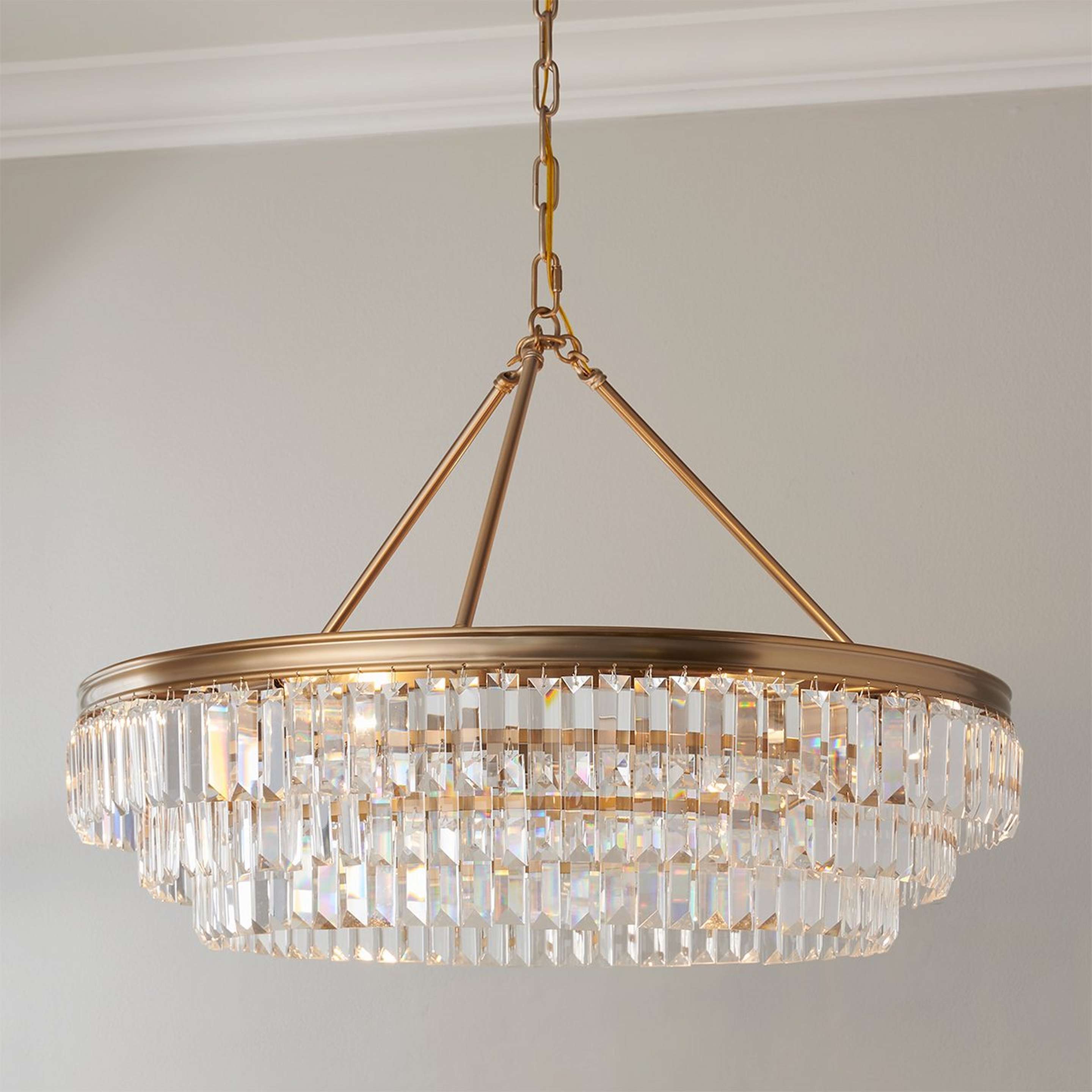 A Faceted Glass Layered Chandelier - 30" with Gold color