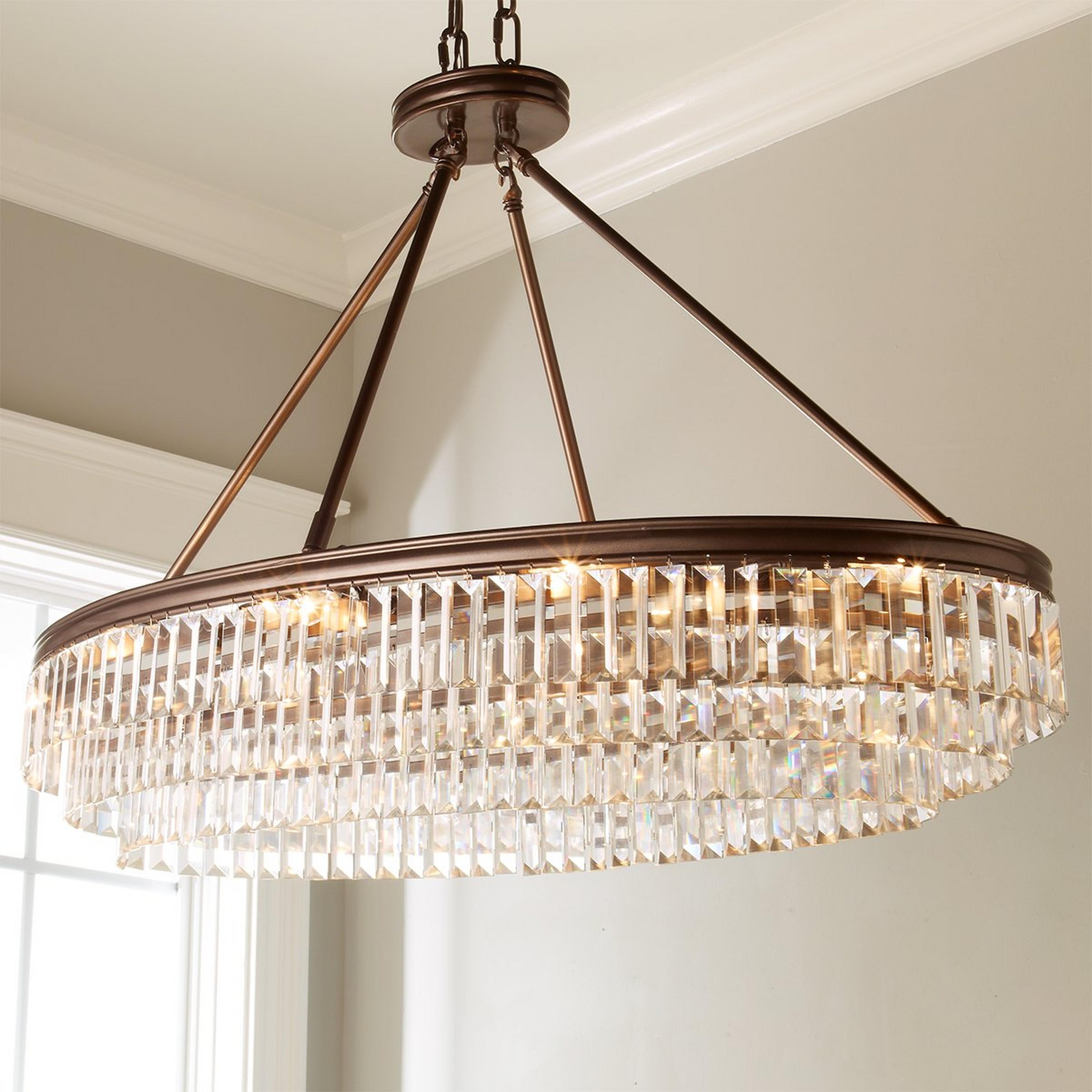 A Faceted Glass Layered Island Chandelier with Bronze color